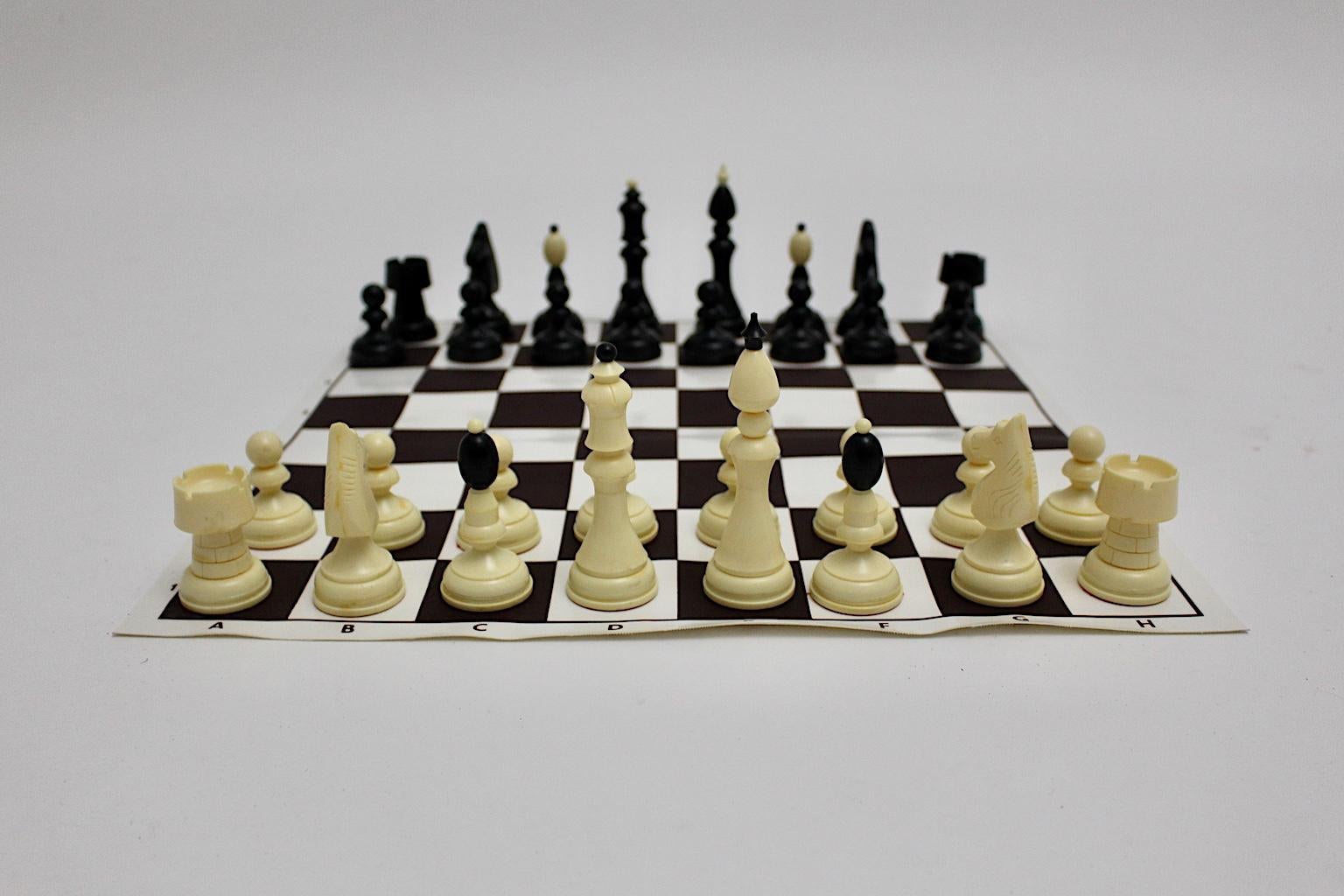 Modern vintage black and white plastic chess Austria 1970s,
The plastic game board is flexible and therefore it allows the board to roll.
The figures were made of plastic, King height is 11 cm.
No box included
The vintage condition is good with