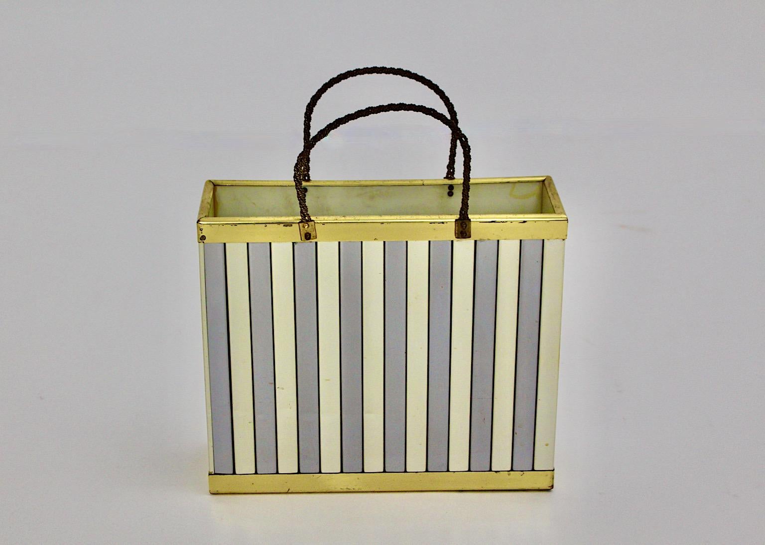Modern vintage newspaper rack or magazine rack Romeo Rega Style from chromed and brassed metal with braided brass handles, which was designed and manufactured in Italy, 1970s.
Amazing shape like a shopping bag.
Linear structure of the metal