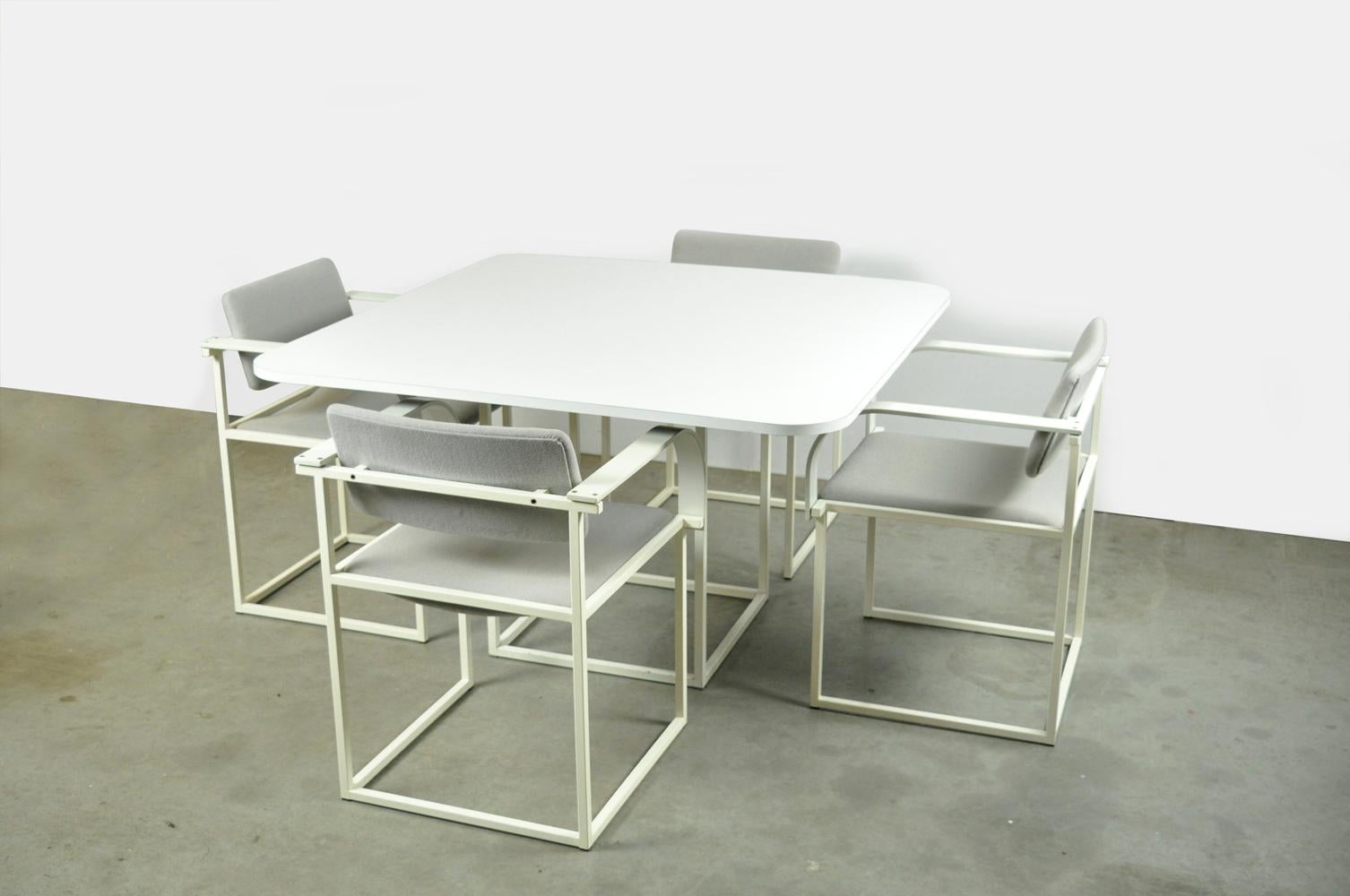 Set of 4 modern vintage dining table chairs type FM80 with matching dining table, type TM40, designed by the duo Pierre Mazairac & Karel Boonzaaijer for Pastoe, 1980s. The chairs have a white spray-painted metal tubular frame with white curved