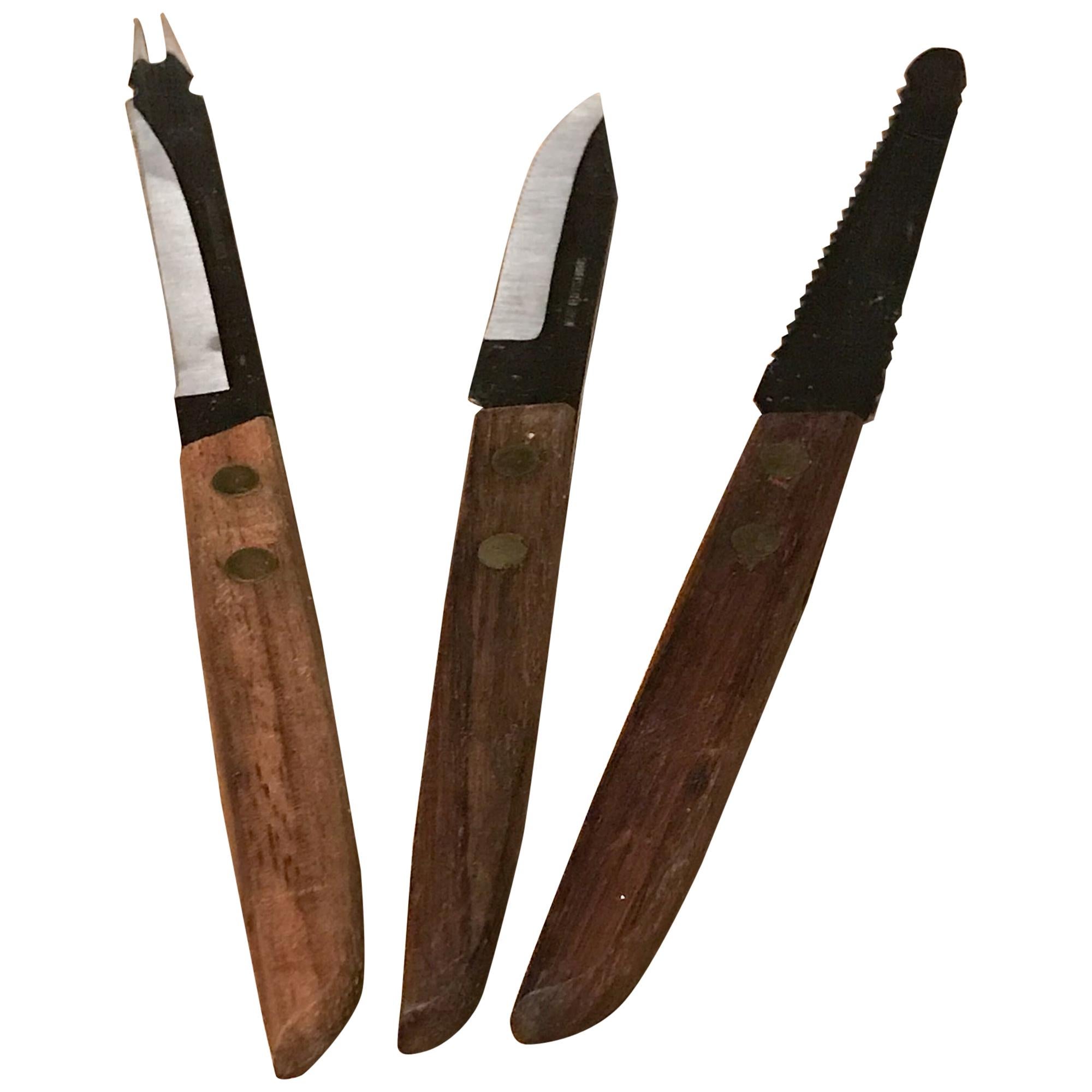 1960s Japanese Knife Set of three pieces
Rosewood & Stainless-Steel
Cheese prong tip bar knife, All-purpose double sided serrated and Paring utility knife
(1) 7.75L x .5 H, x .38 (2) 7 L, (3) 6.5
Stamped Japan
Original Unrestored Vintage Preowned