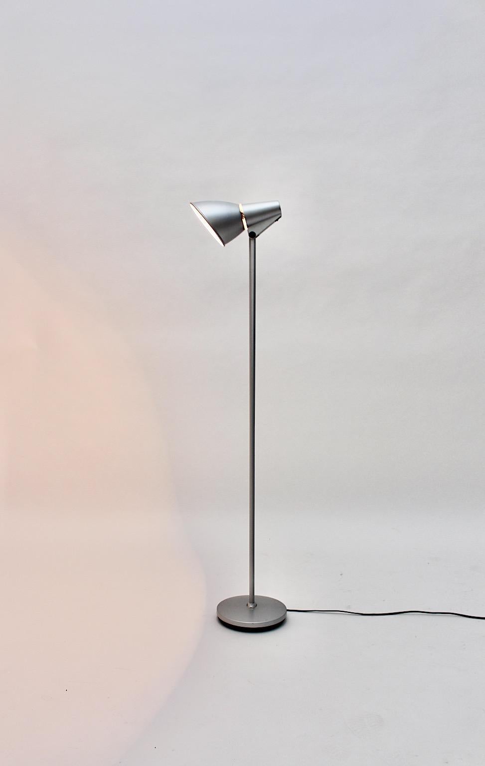 Modern vintage floor lamp from liver metal model spy designed by Hannes Wettstein for Artemide 1996, Italy.
An amazing floor lamp designed by Hannes Wettstein model Spy 
for Artemide Pregagnana Milanese Italy from silver lacquered aluminum and