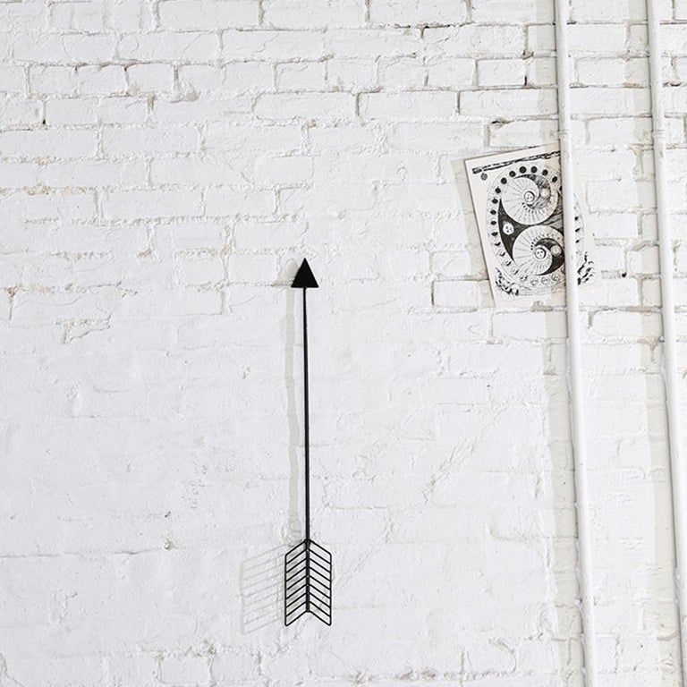 Bend Goods wire furniture
The wall arrow is a fun way to add personality to your space. It looks great on shelving or leaning against a fireplace. It also features convenient mounting loops and can be attached to a wall. Try one or group them