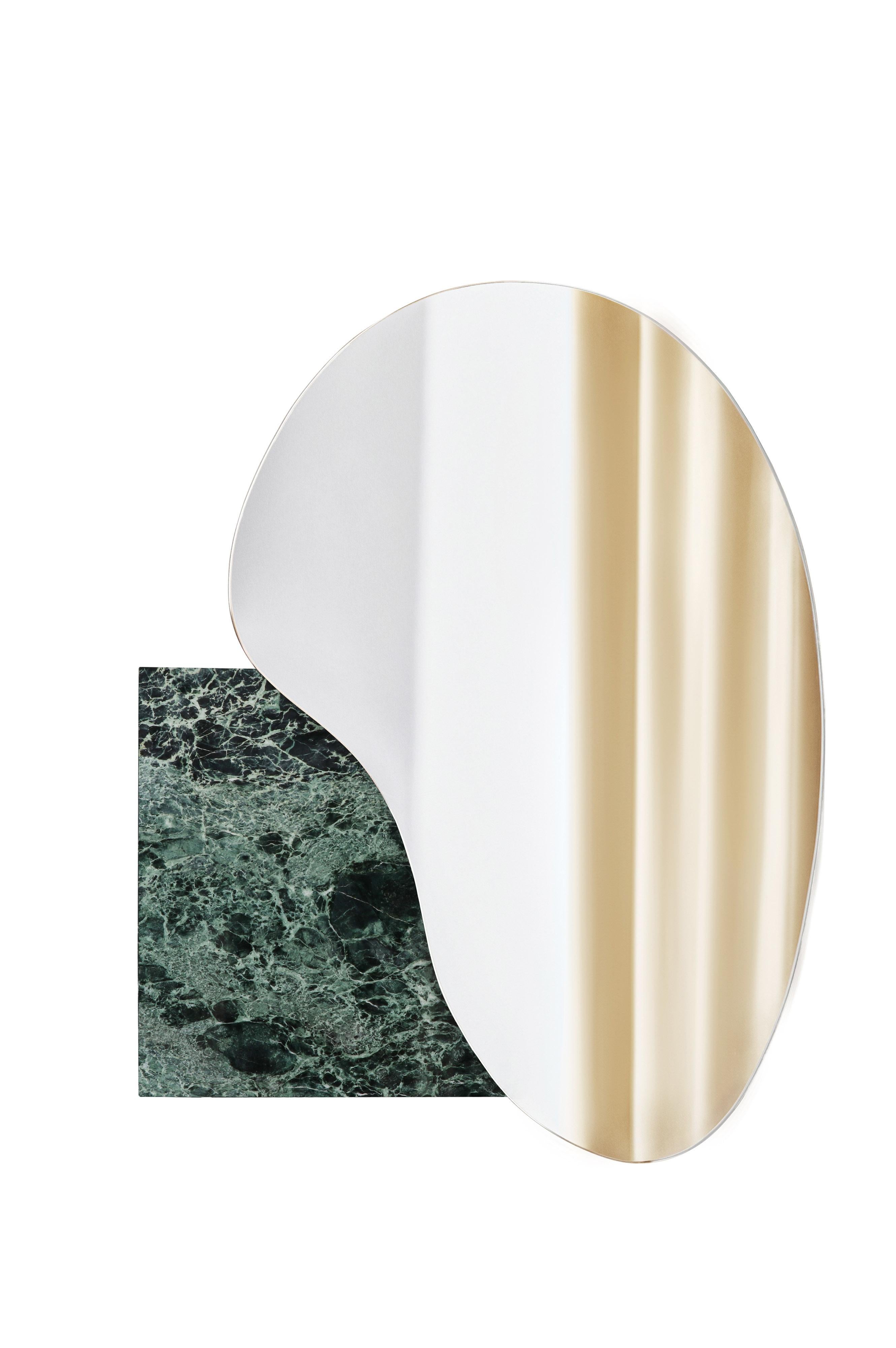 Modern lake wall mirror by Noom
Designers: Maryna Dague & Nathan Baraness

Model shown in picture:
Number 4
Base green marble verde ocean

