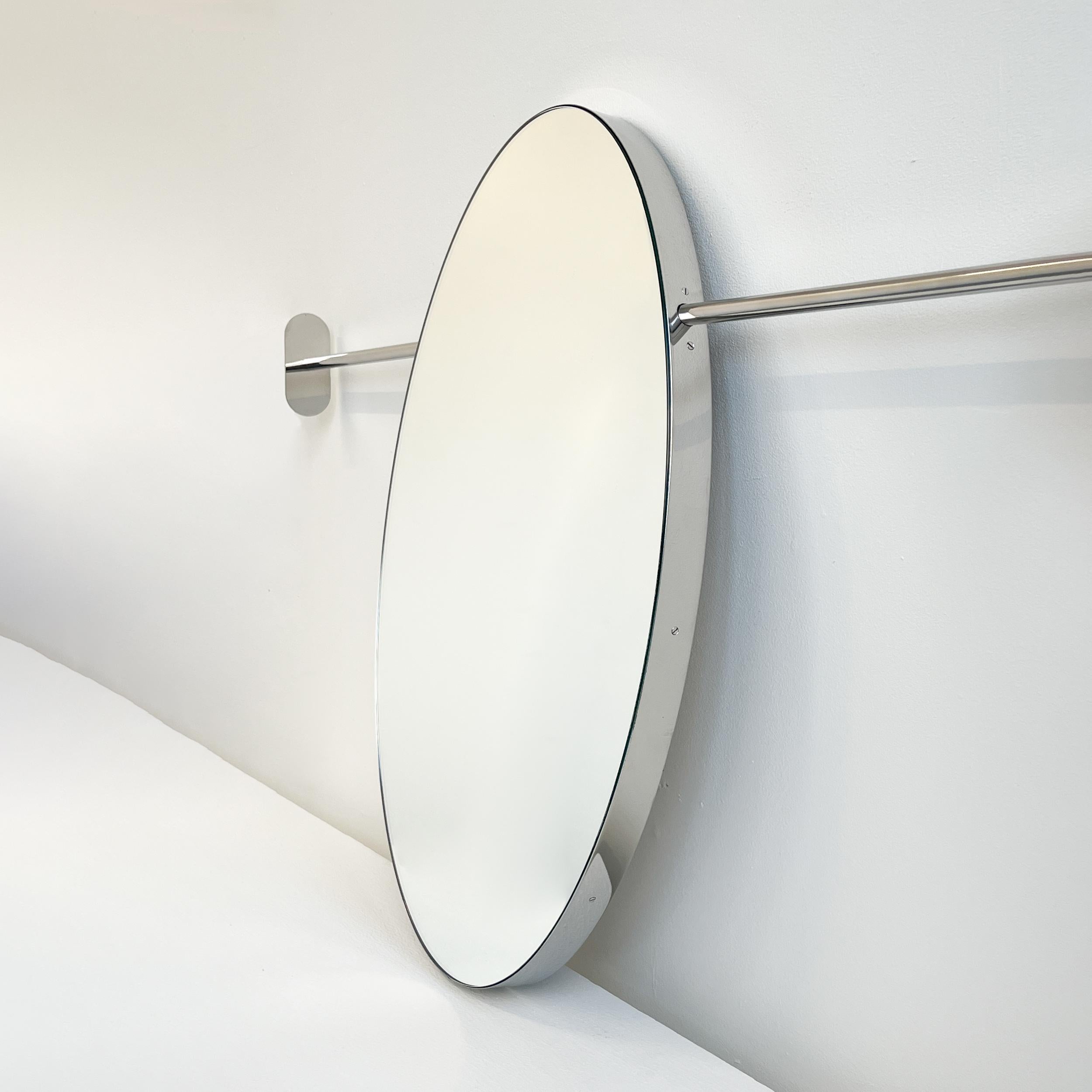 Modern Wall-to-Wall Orbis™ mirror with a minimalist frame. This mirror is the latest addition to our flexible and ingenious range of suspended mirrors. Designed and handcrafted in London, UK.

Mirror dimensions (customisable): H 60cm x W 40cm x D