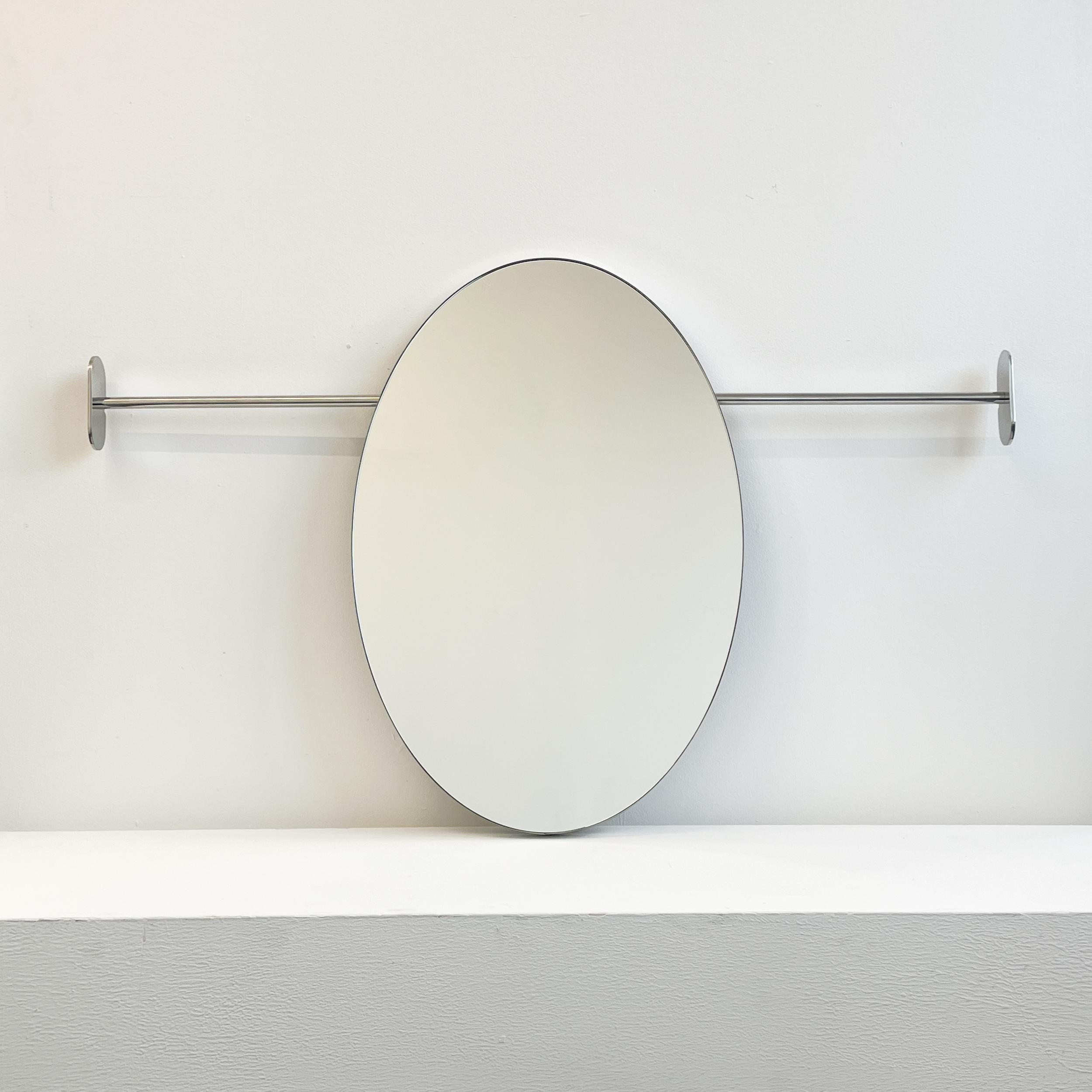 British Modern Wall to Wall Oval Mirror with Minimalist Stainless Steel Frame For Sale