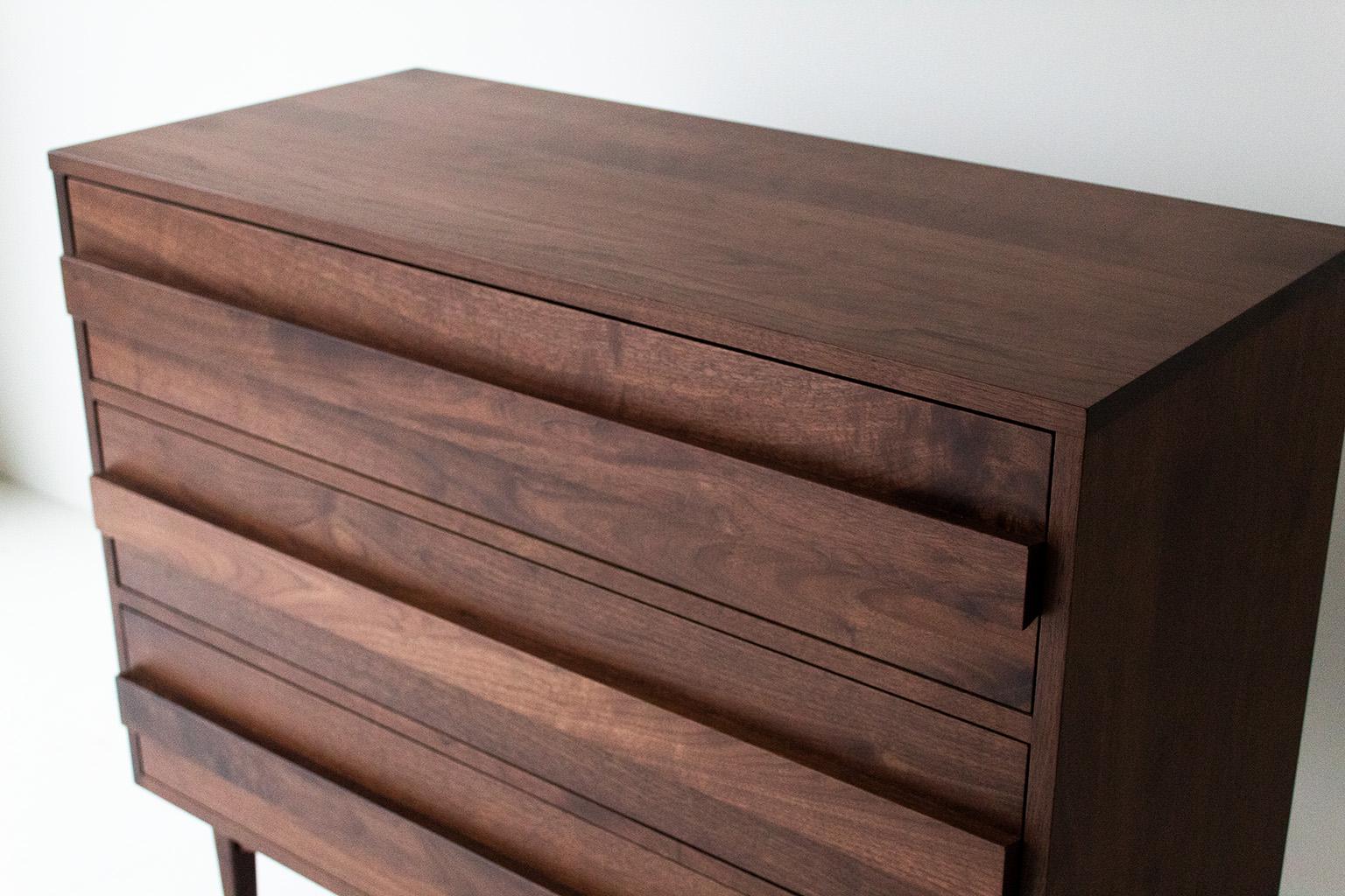 This Modern walnut 3-drawer dresser is made in the heart of Ohio with locally sourced wood. Each piece is hand-made with solid walnut and finished with a beautiful matte commercial grade finish. It is important to us to let the natural beauty of the