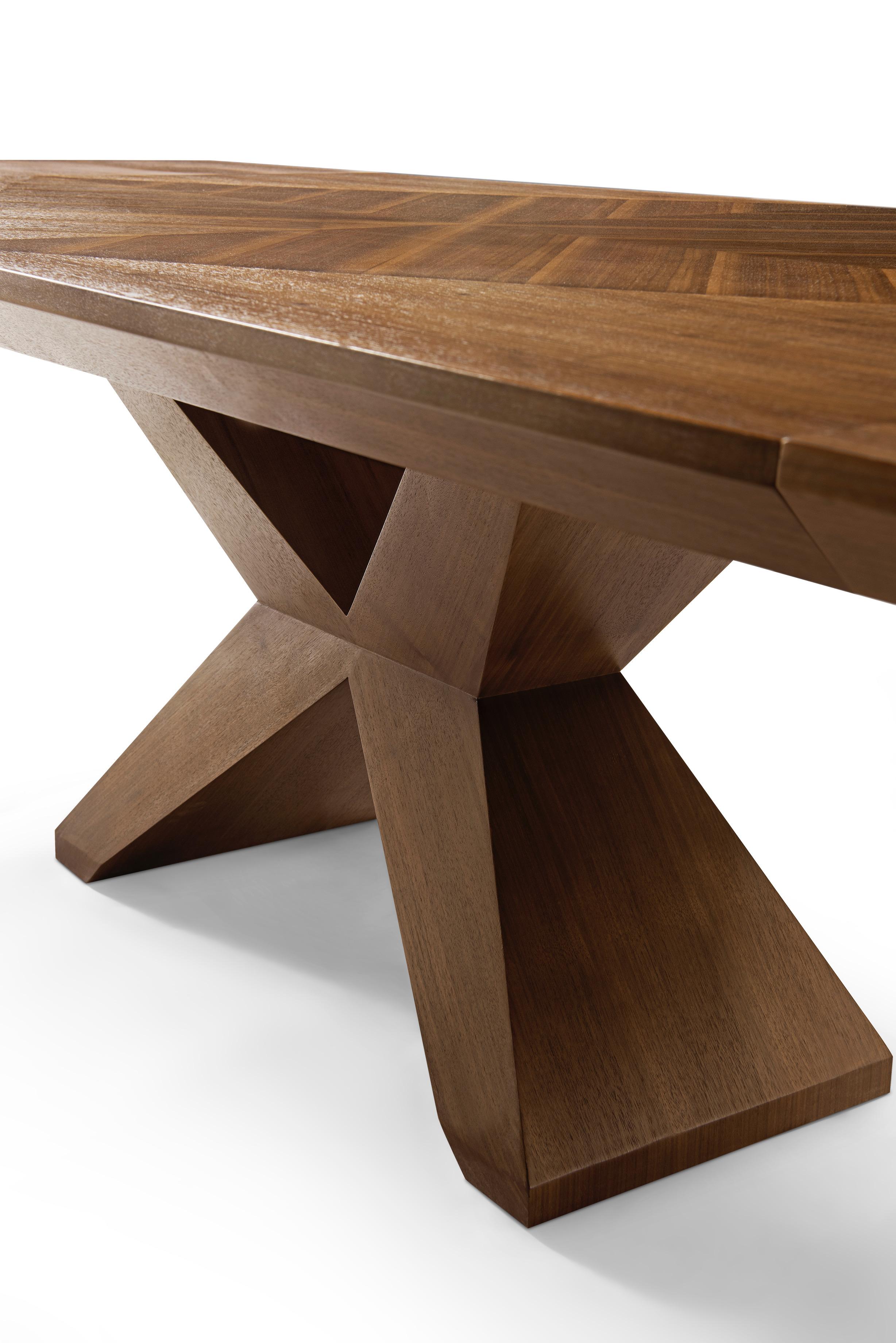 Modern Walnut Dining Table Designed by Greg Sheres.   The “Angles” table top features a geometric design. Fully extended with leaves, this dining table opens up to 114-inches, giving you plenty of room to gather friends and family for dinner. The