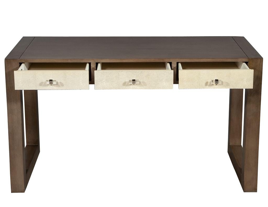 Modern walnut parchment desk. Featuring a sleek walnut frame accented with parchment drawer fronts. Finished with modern acrylic and metal hardware.

Price includes complimentary curb side delivery to the continental USA.