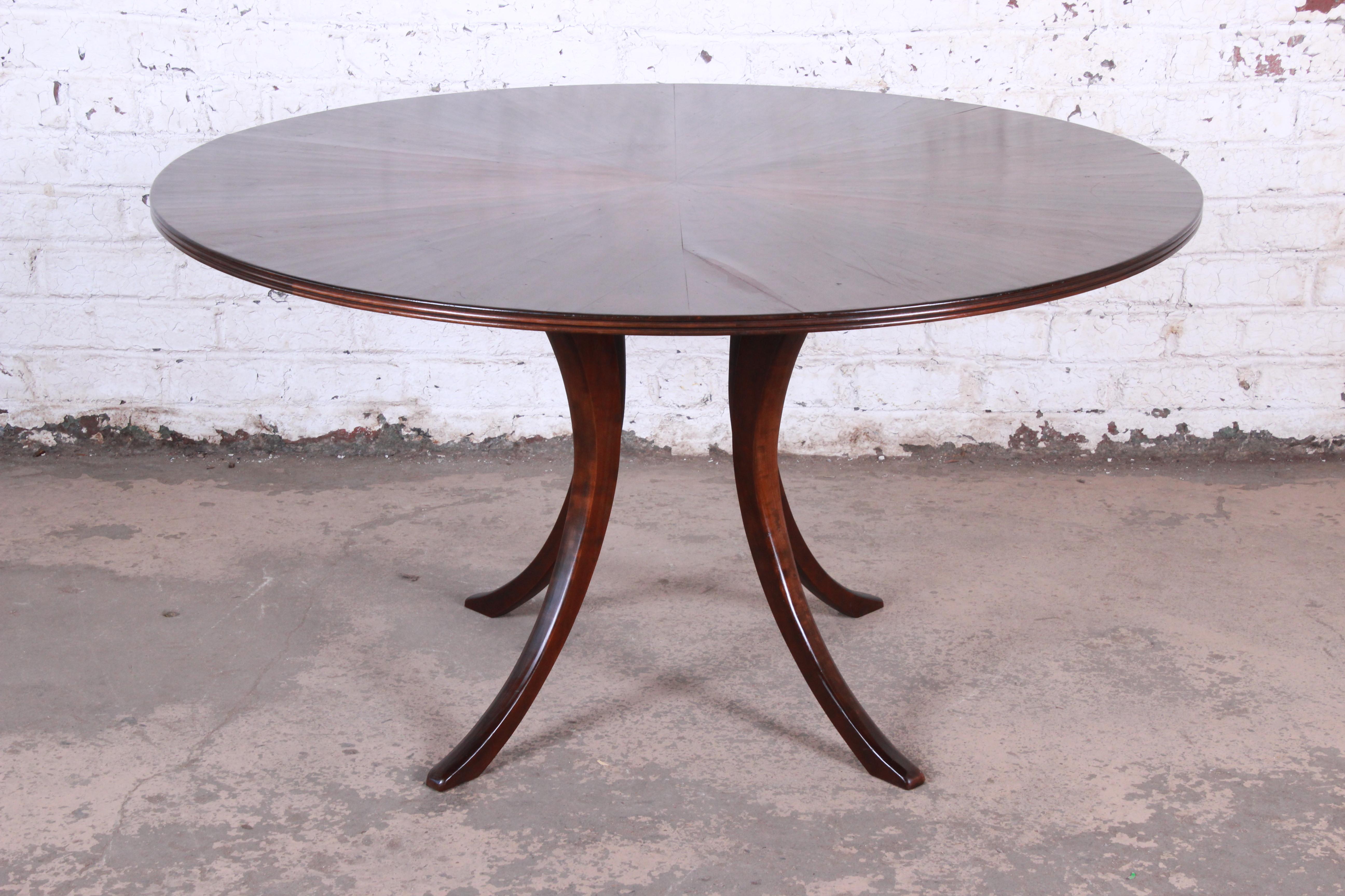 Modern Walnut Saber Leg Dining Table with Inlaid Starburst Parquetry Top In Good Condition In South Bend, IN