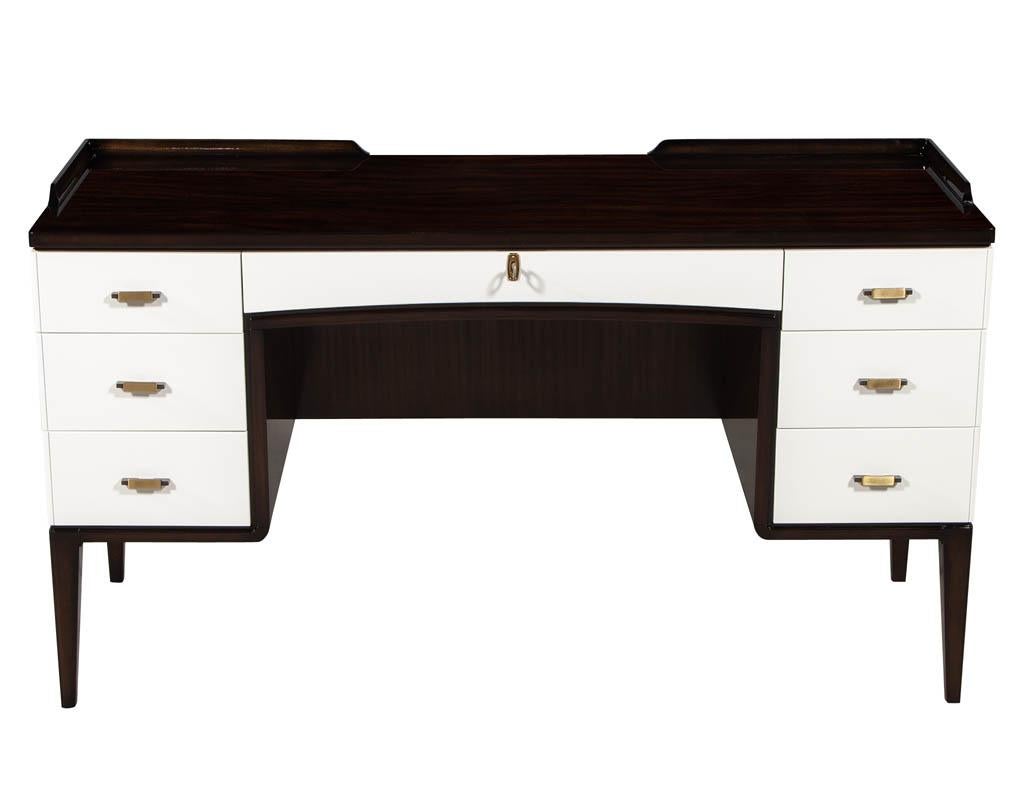 Modern walnut writing desk vanity. Featuring two tone dark walnut and white lacquer finish. Complemented with sleek brass hardware.

Price includes complimentary curb side delivery to the continental USA.