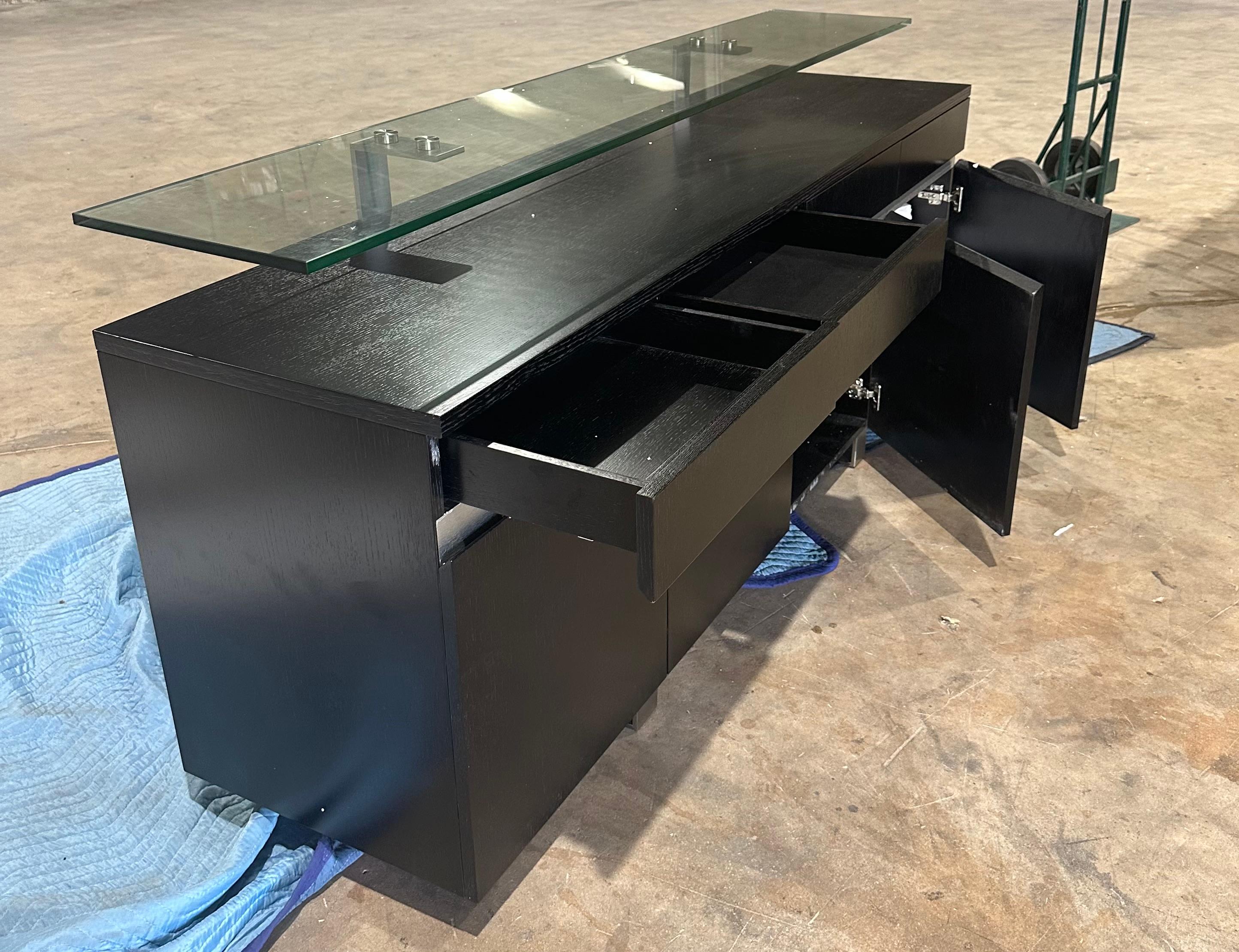 Veneer Modern Wenge buffet with floating glass top designed by Greg Sheres.  In stock. For Sale