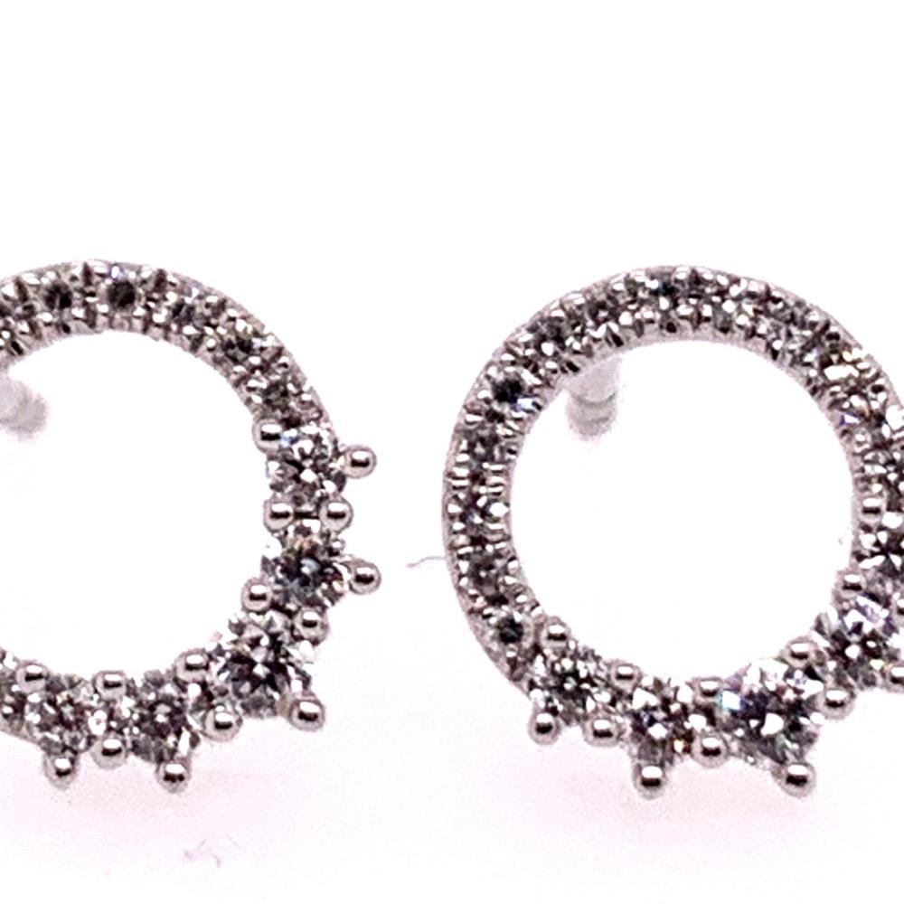 Stunning Modern 14k White Gold 0.22 Carat Natural Colorless Diamond Circle Earrings. The pair is set with 36 round brilliant diamonds and the total weight is 1.3 grams.