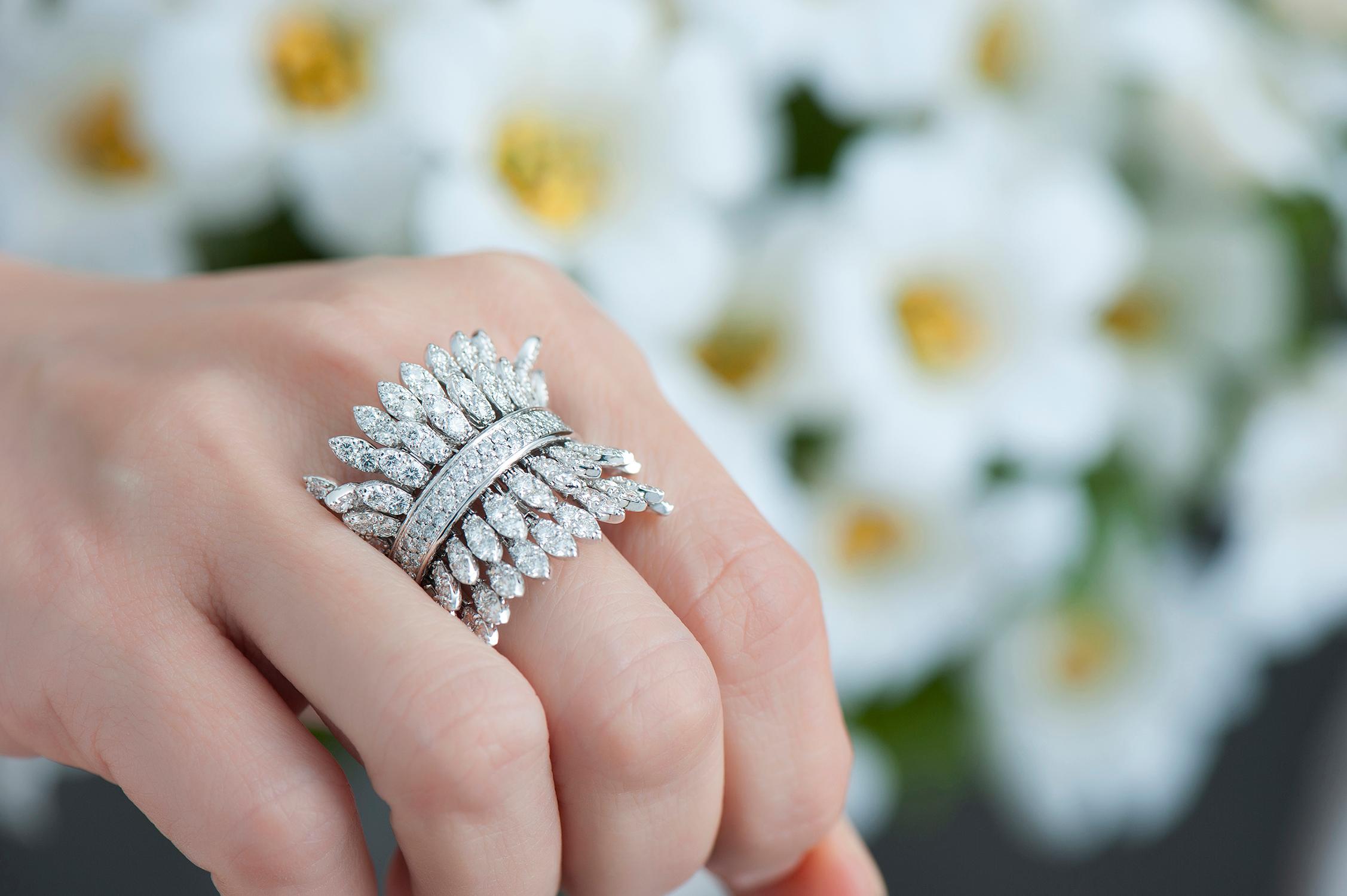 18K White Gold Spettinato Ring with White Diamonds.
Petals are kinetic with movement.
Gold Weight: 16.15 grams
Diamond Carats: 4.23

FerrariFirenze, Handmade in Italy.
US Ring Size: 7
Style: FF046RG21

18k White Gold Cocktail Diamond Ring, ideal for