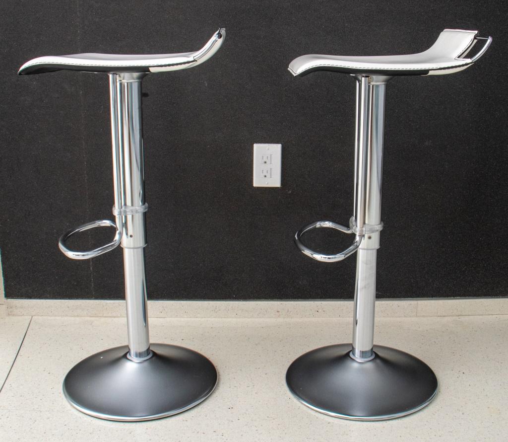 white leather and chrome bar stools