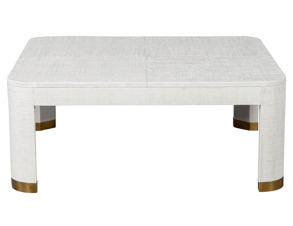 Modern white linen clad coffee table. Featuring clean modern design and brass capped feet.
Price includes complimentary scheduled curb side delivery service to the continental USA.