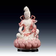 Modern White Porcelain Buddha in Pink Holding a Lotus Flower