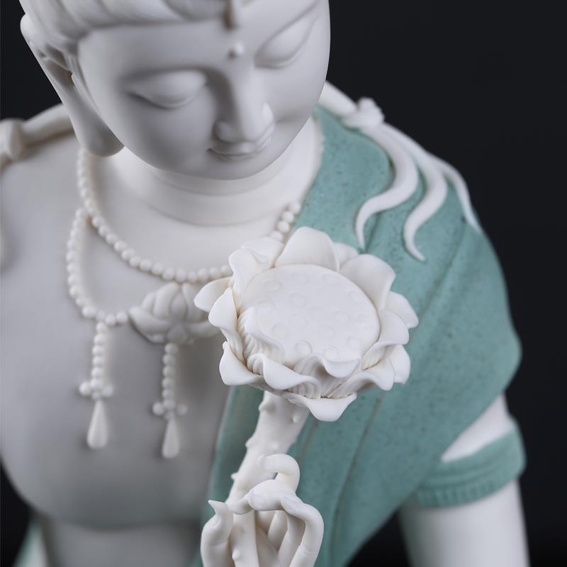 Modern White Porcelain Sitting Buddha in Blue Robe Holding a Lotus Flower For Sale 6