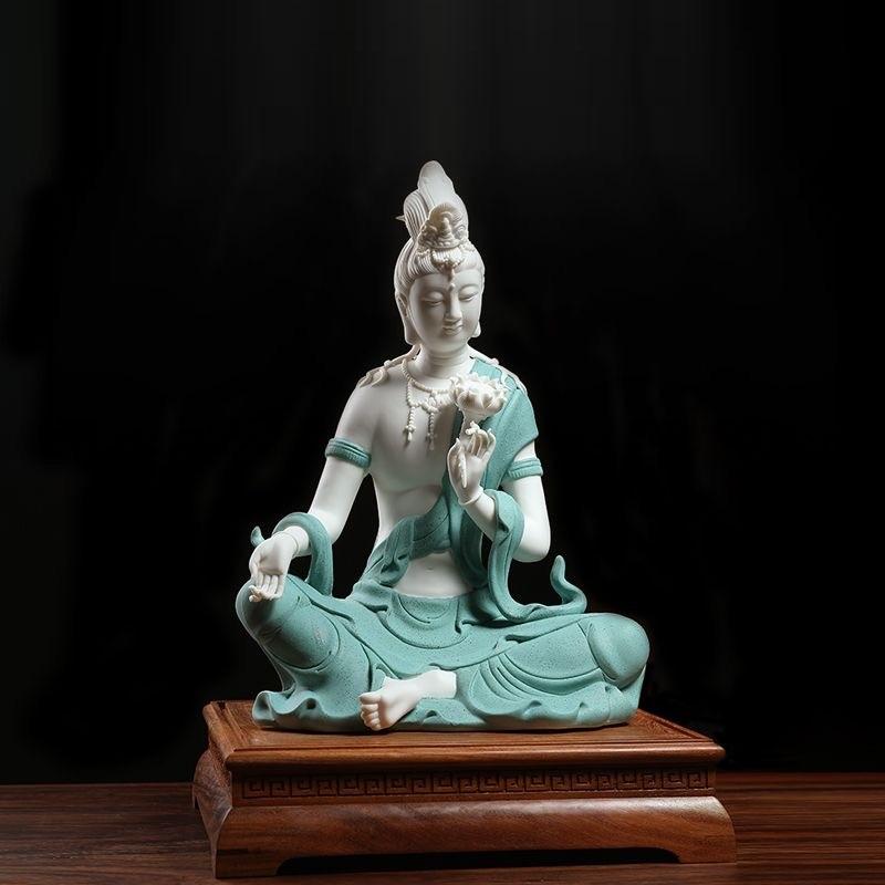 Modern White Porcelain Sitting Buddha in Blue Robe Holding a Lotus Flower For Sale 3