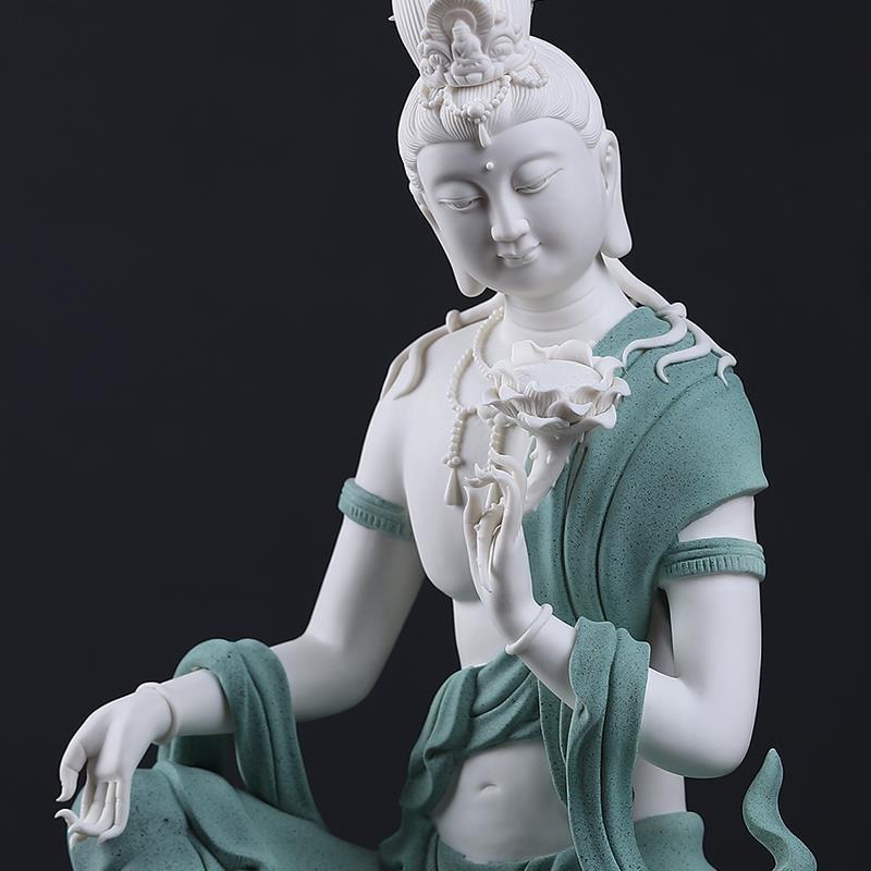 Modern White Porcelain Sitting Buddha in Blue Robe Holding a Lotus Flower For Sale 4