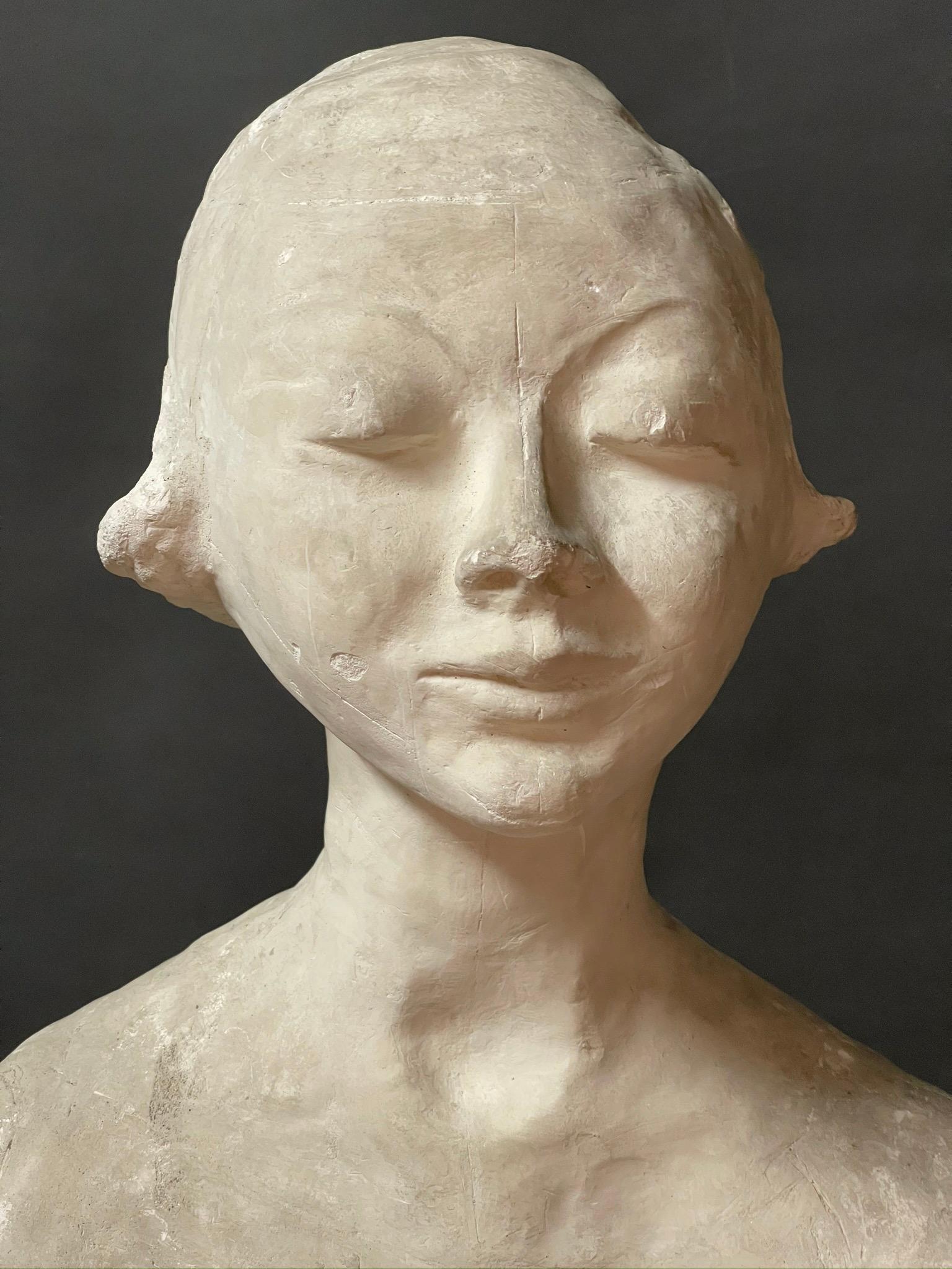 Very interesting plaster sculpture depicting a lovely young woman. 
The author is an Italian artist Ida Fua who worked in Torno near Como. 
The elegant, elongated neck, recalls the Italian Maestro Amedeo Modigliani. 

This artwork is shipped from
