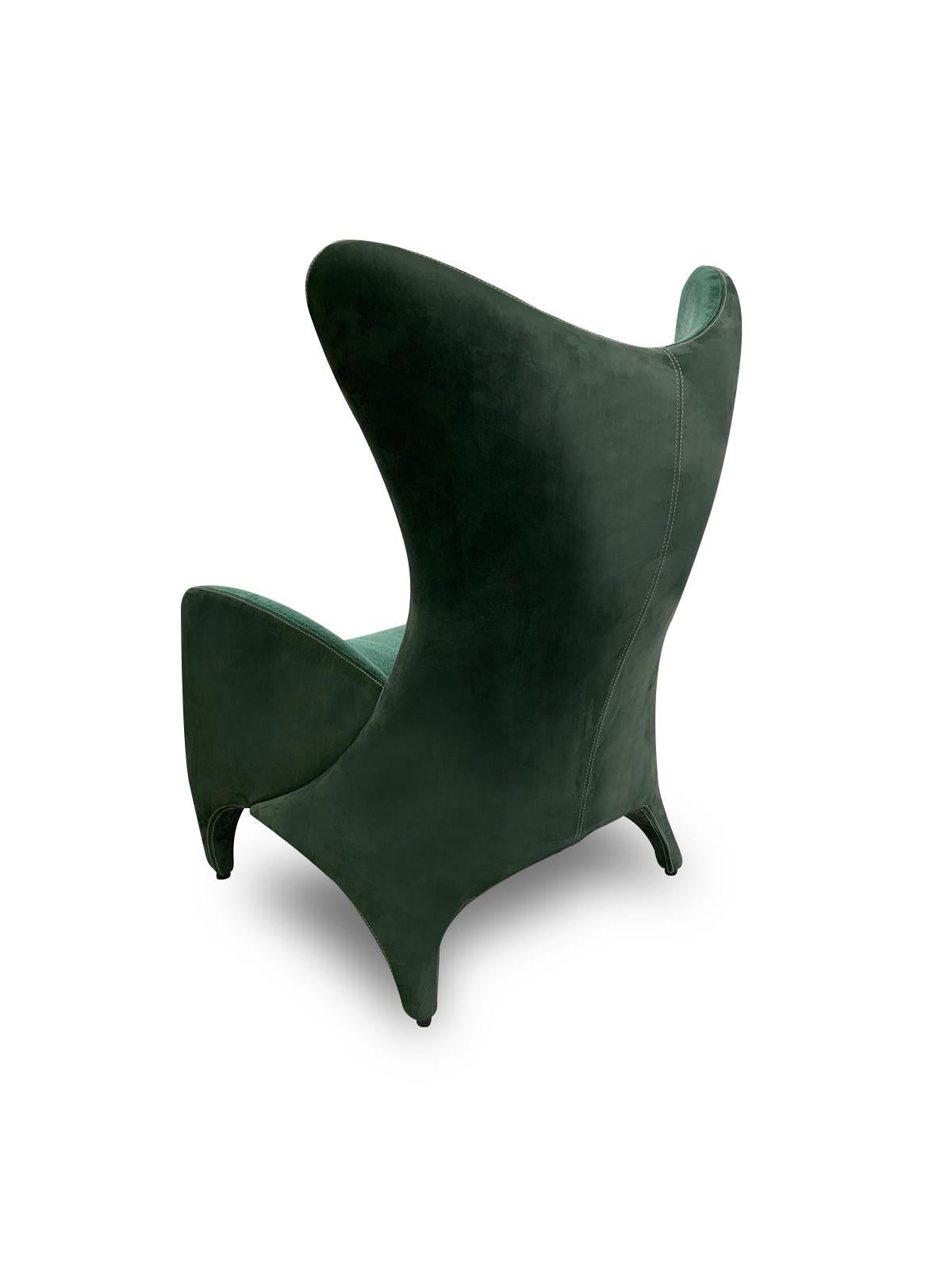 green velvet wing chair