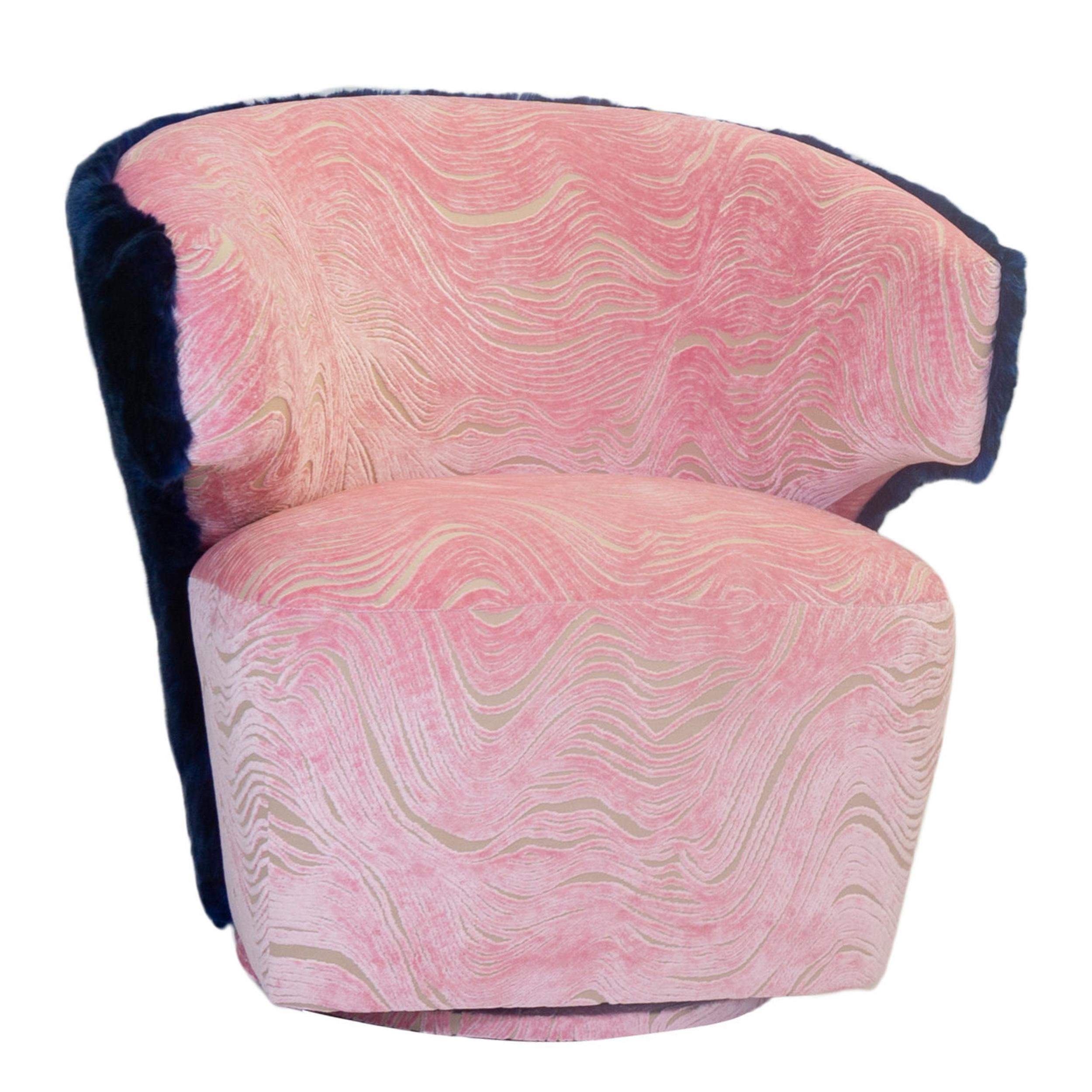 Customizable swivel chair, as shown with Designers Guild cut velvet and soft faux fur back. This piece has an impressively small footprint but is large enough to comfortably sit taller folks. The tight seat is firm but very forgiving and does not