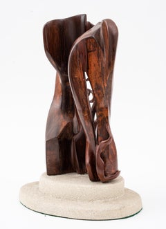 Sculpture moderne en bois sculpté représentant un visage de formes abstraites