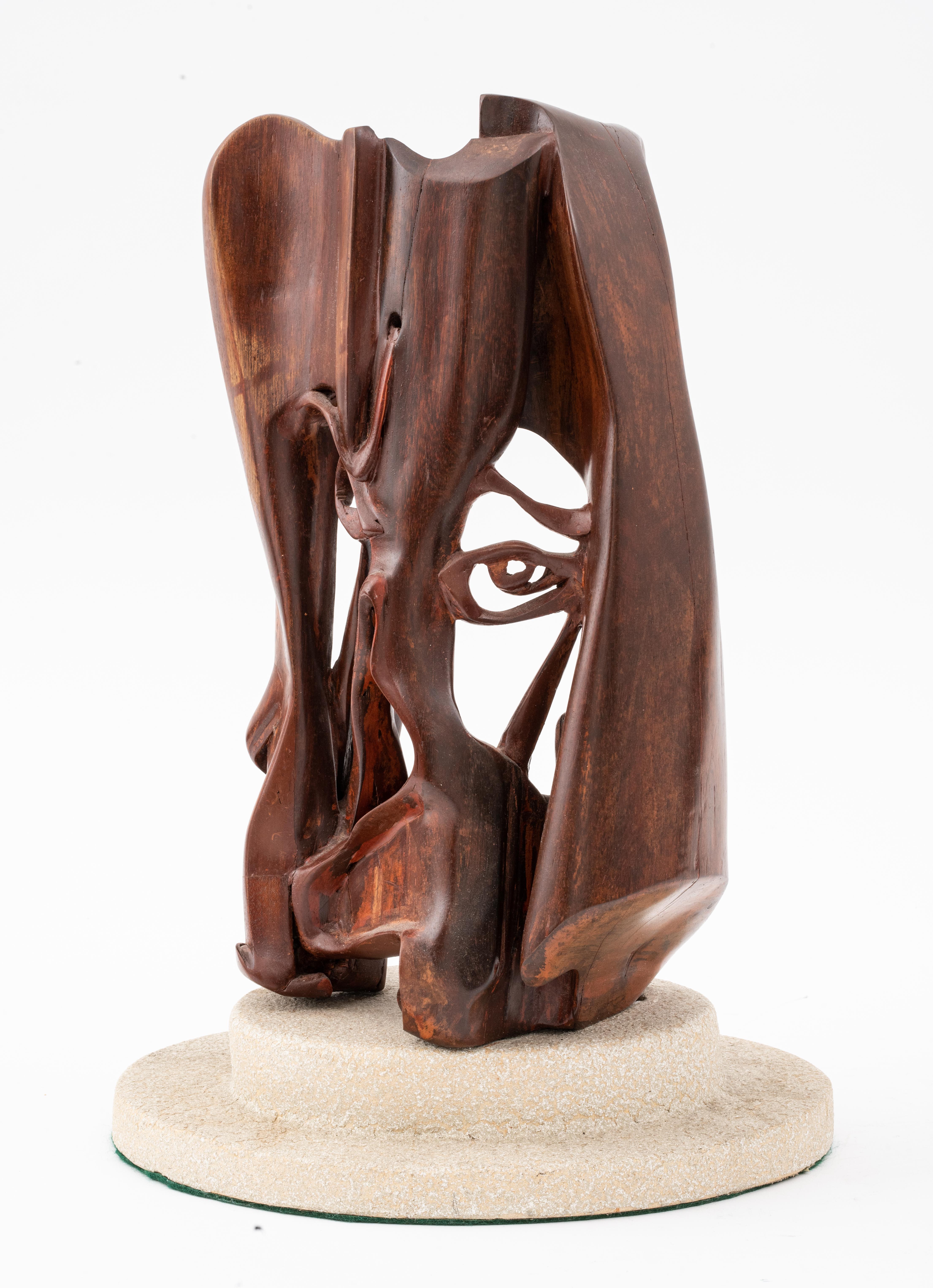 wooden face sculpture