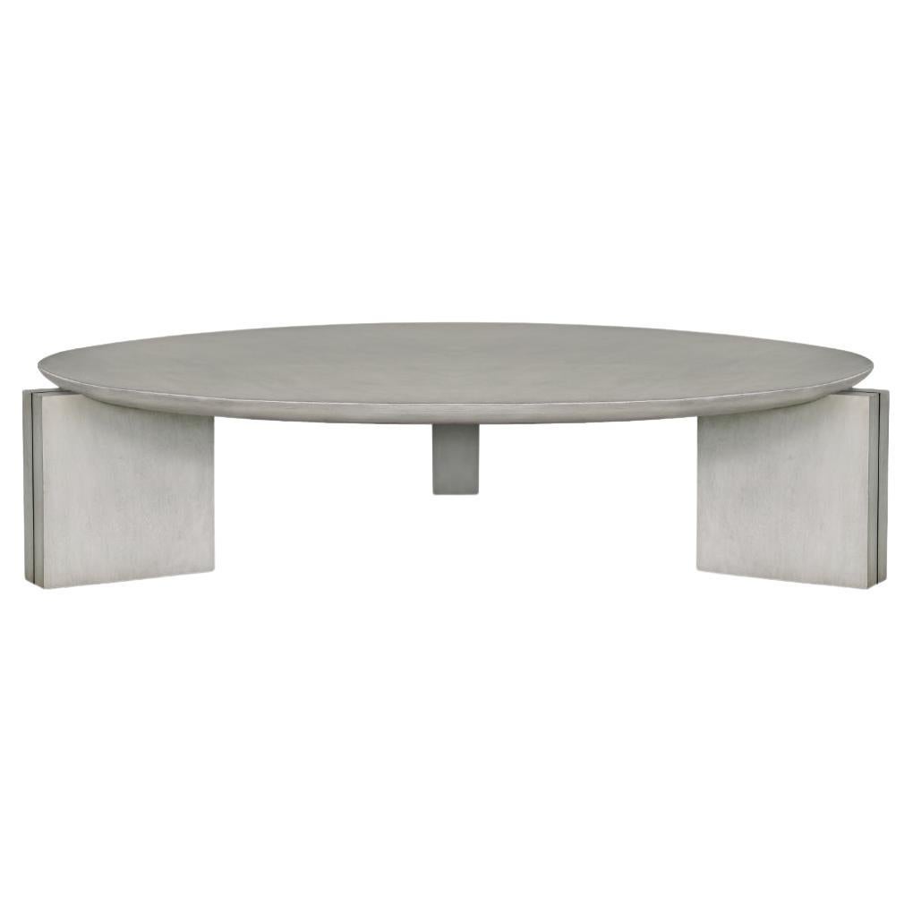 Modern wood Chianni cocktail table, circular top & rectangular legs, brass inlay