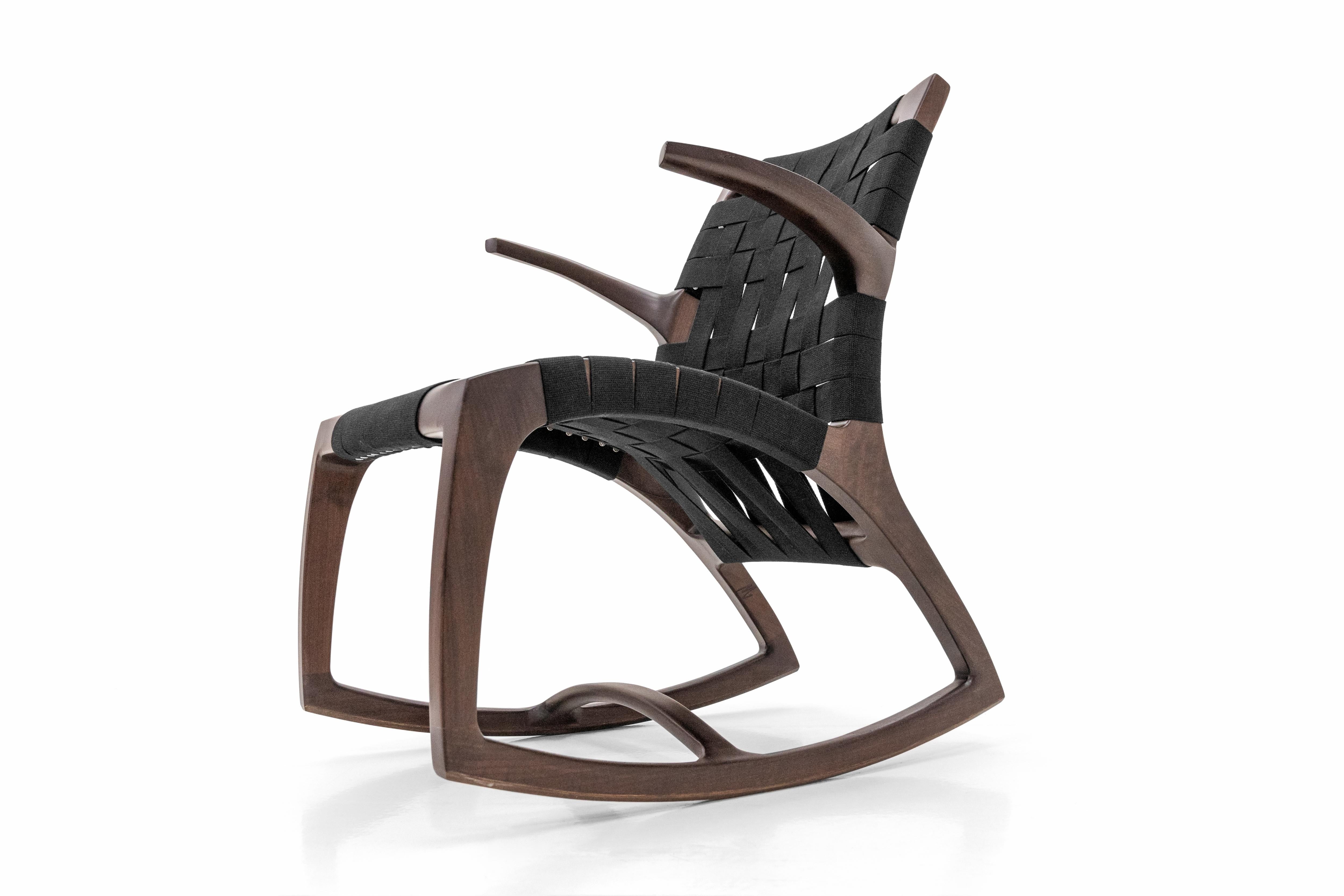 Ebonized walnut. Rocking chairs have been a focus of furniture designers for centuries, quite simply because they are difficult to make. Here’s one where comfort and design meet right in the middle. The Luna Rocker was designed by Martin Goebel in