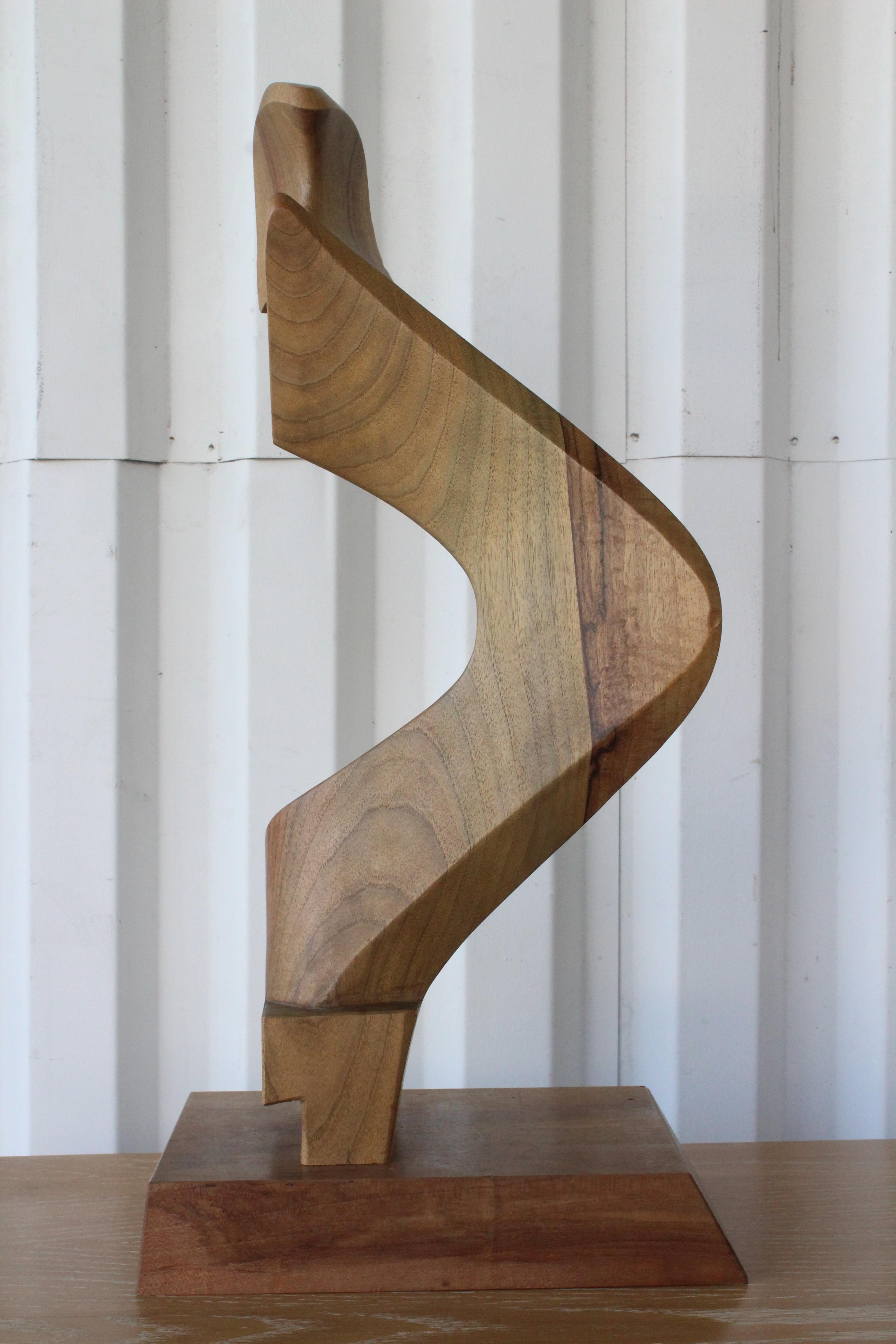 A modern wood sculpture. Signed by the artist. Excellent condition.