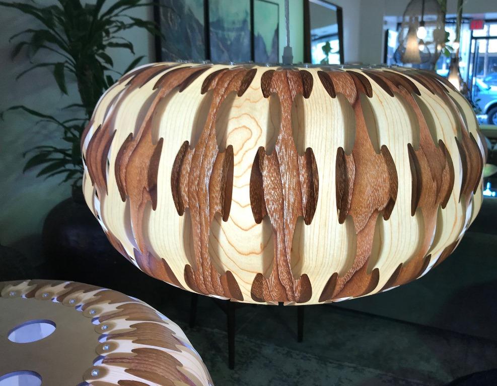 Beautiful, eye-catching lights featuring a wonderful modern design of interlaced maple and walnut wood veneer curved segments.

We haven't seen anything quite like these before.

Sure to stand out in any setting, modern or otherwise.

Please