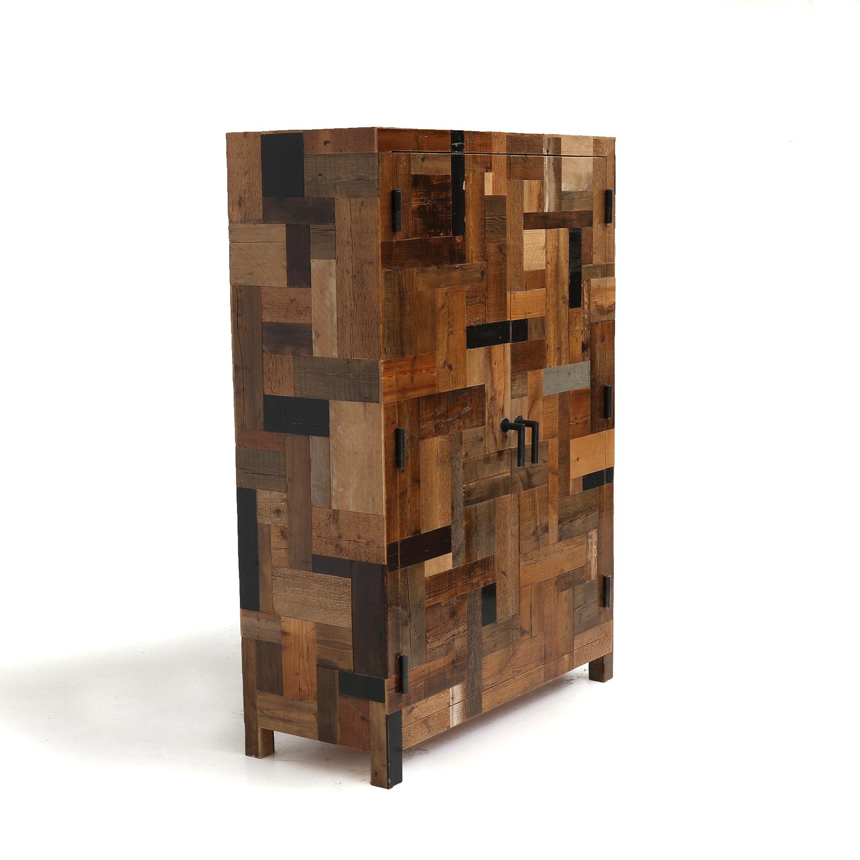 Modern Wooden Cabinet - Dark Waste Cabinet in Scrapwood by Piet Hein Eek

The Waste Cabinet in Scrapwood is meticulously crafted in Piet Hein Eek's studio using traditional woodworking technique. It brings his quintessential vocabulary of recycled