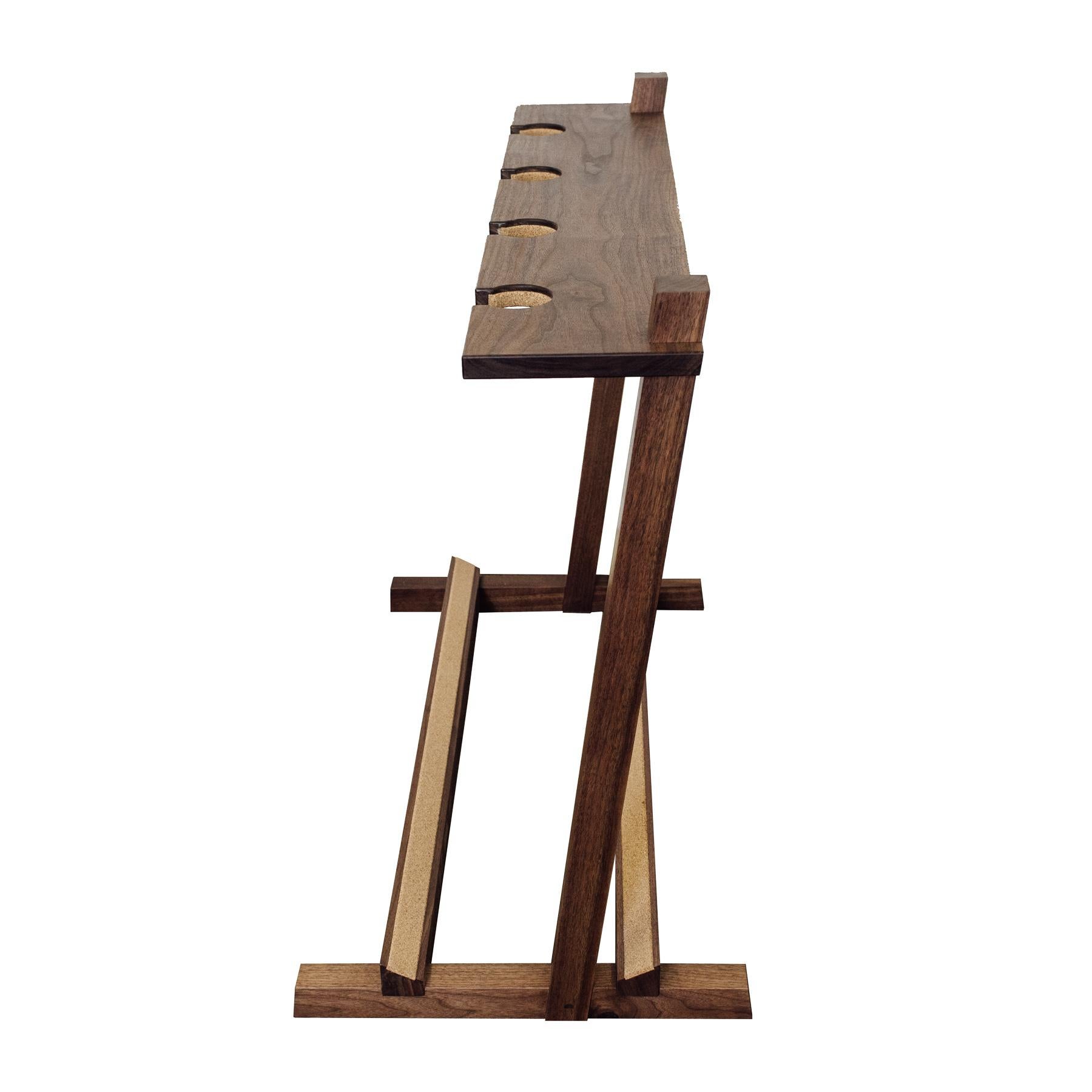 The Olin is a handcrafted wooden guitar floor stand and instrument display. Utilizing American hardwoods and traditional joinery, this stand allows you to keep your instruments at hand without sacrificing design. Graceful in proportion, the Olin