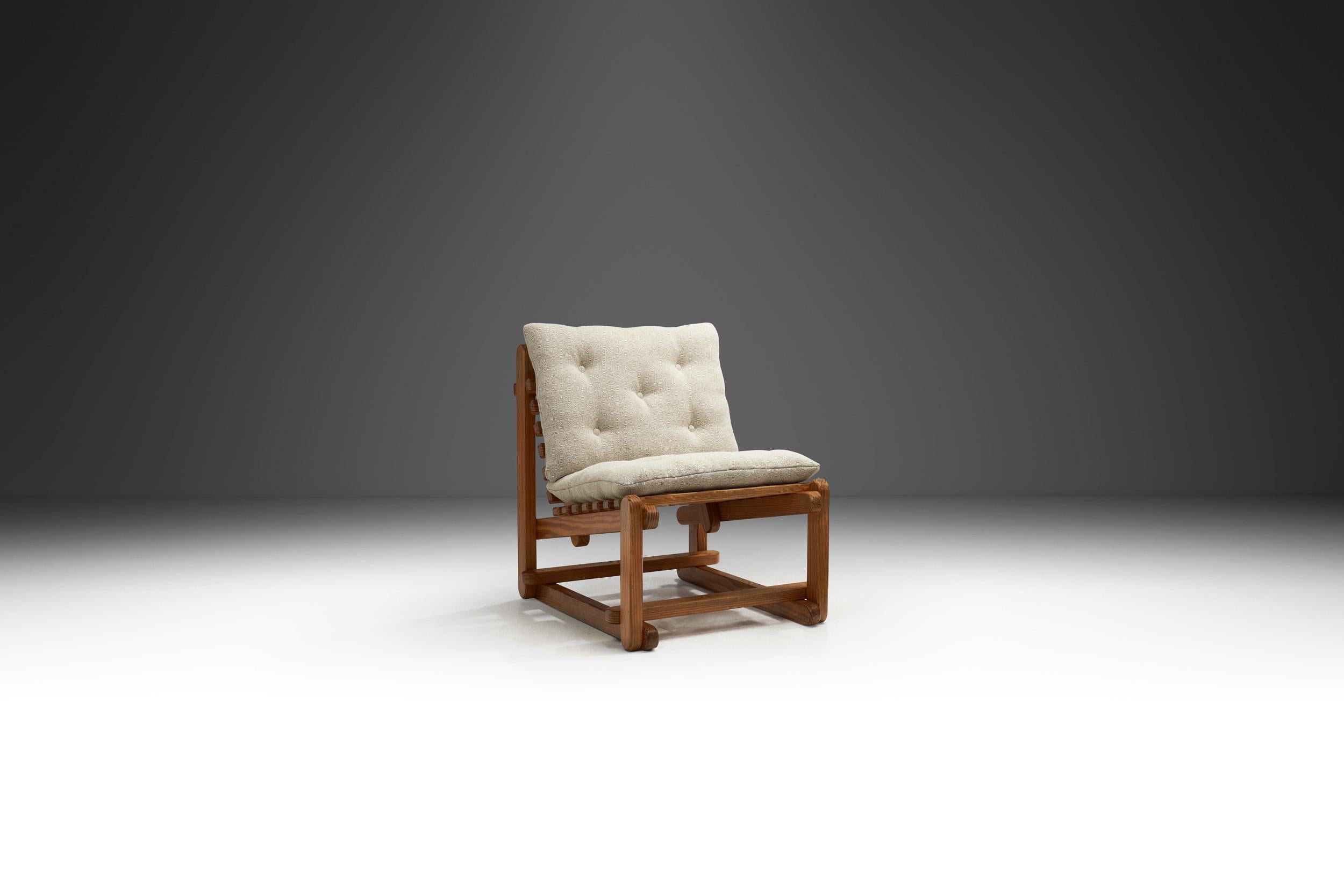 This lounge chair is a stunning embodiment of the design movement that revolutionized interiors during the mid-20th century. The mid-century modern era celebrated clean lines, simplicity, and the authentic use of natural materials - emphasizing