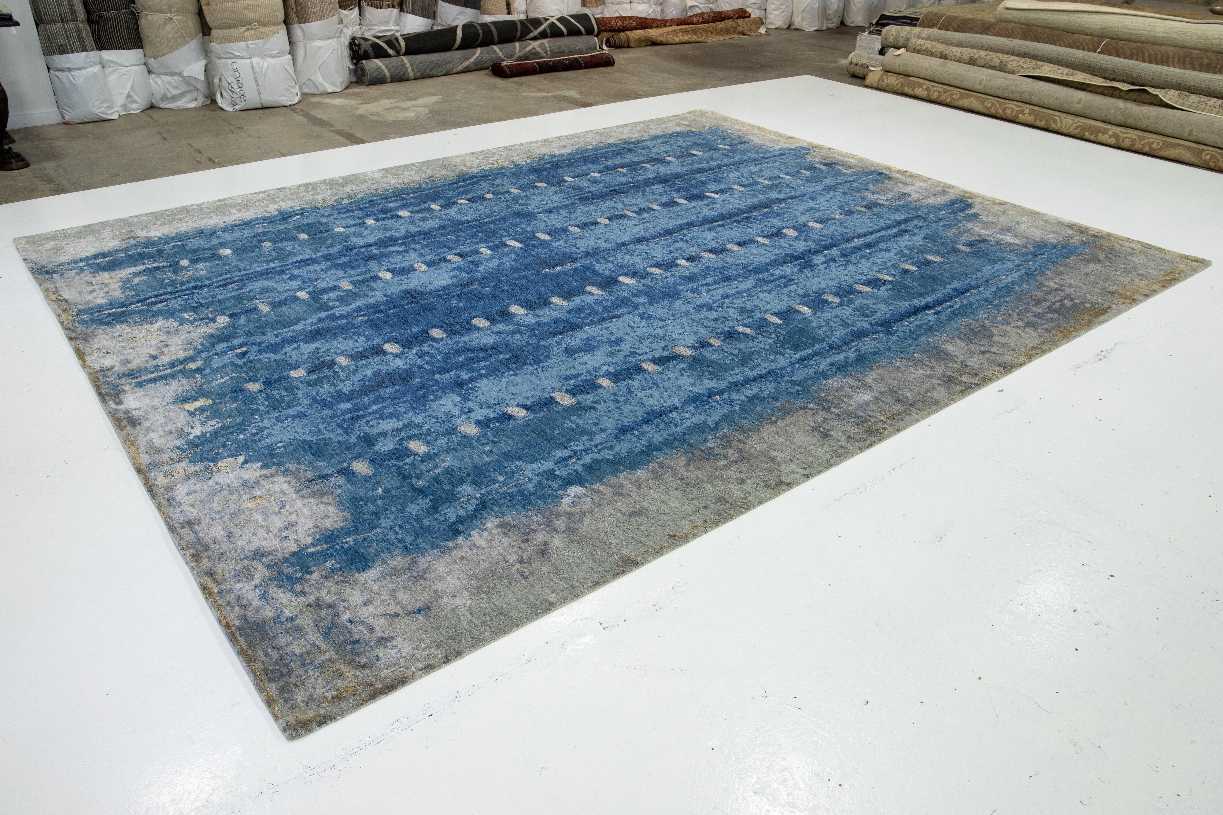 Wool Rug Side View Modern Wool luxury Rug In Blue With Abstract Design For Sale at 1stDibs