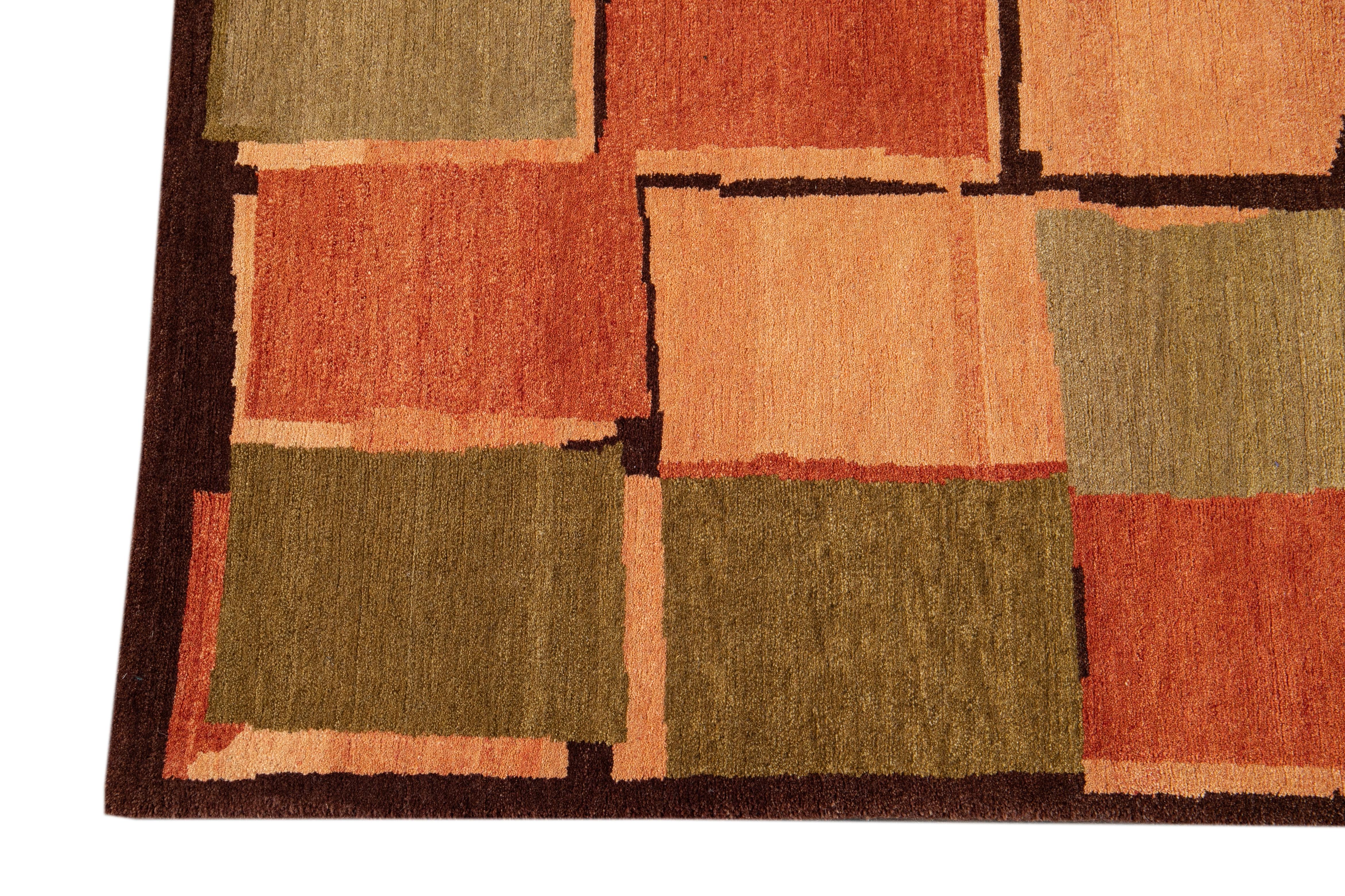 Modern Wool & Silk Tibetan Rug with Geometric Design in Green & Orange In New Condition For Sale In Norwalk, CT