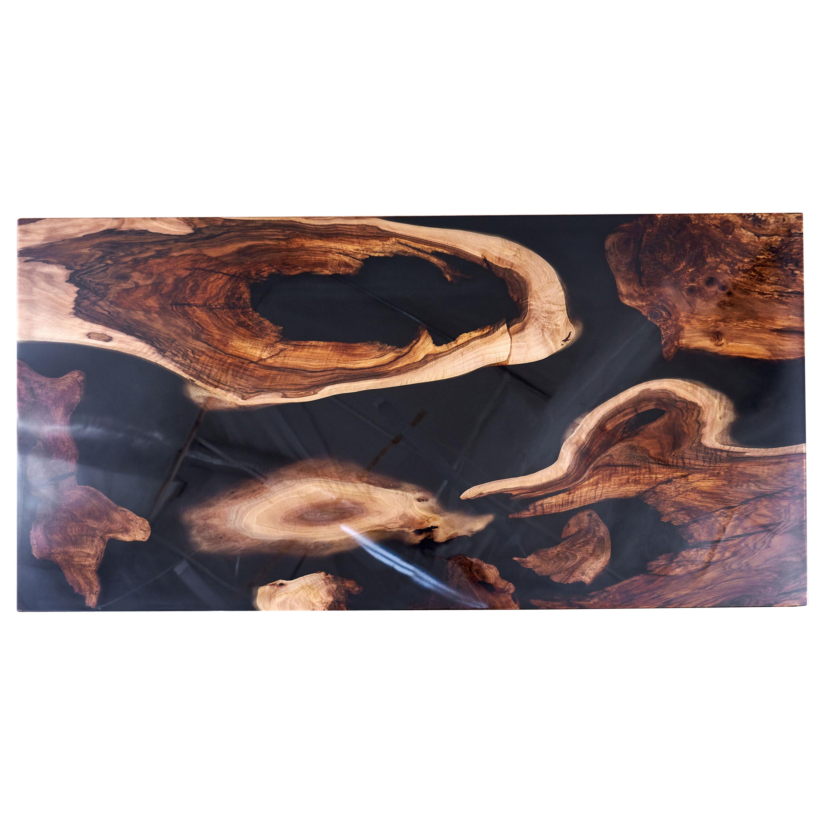 Gorgeous old walnut roots. Authentic texture and character of the walnut vein. Hand leveled, cleaned and filled with a black opaque resin that blends perfectly with the nut roots. Extra layer of epoxy on top for permanent use. Hard lacquer finish