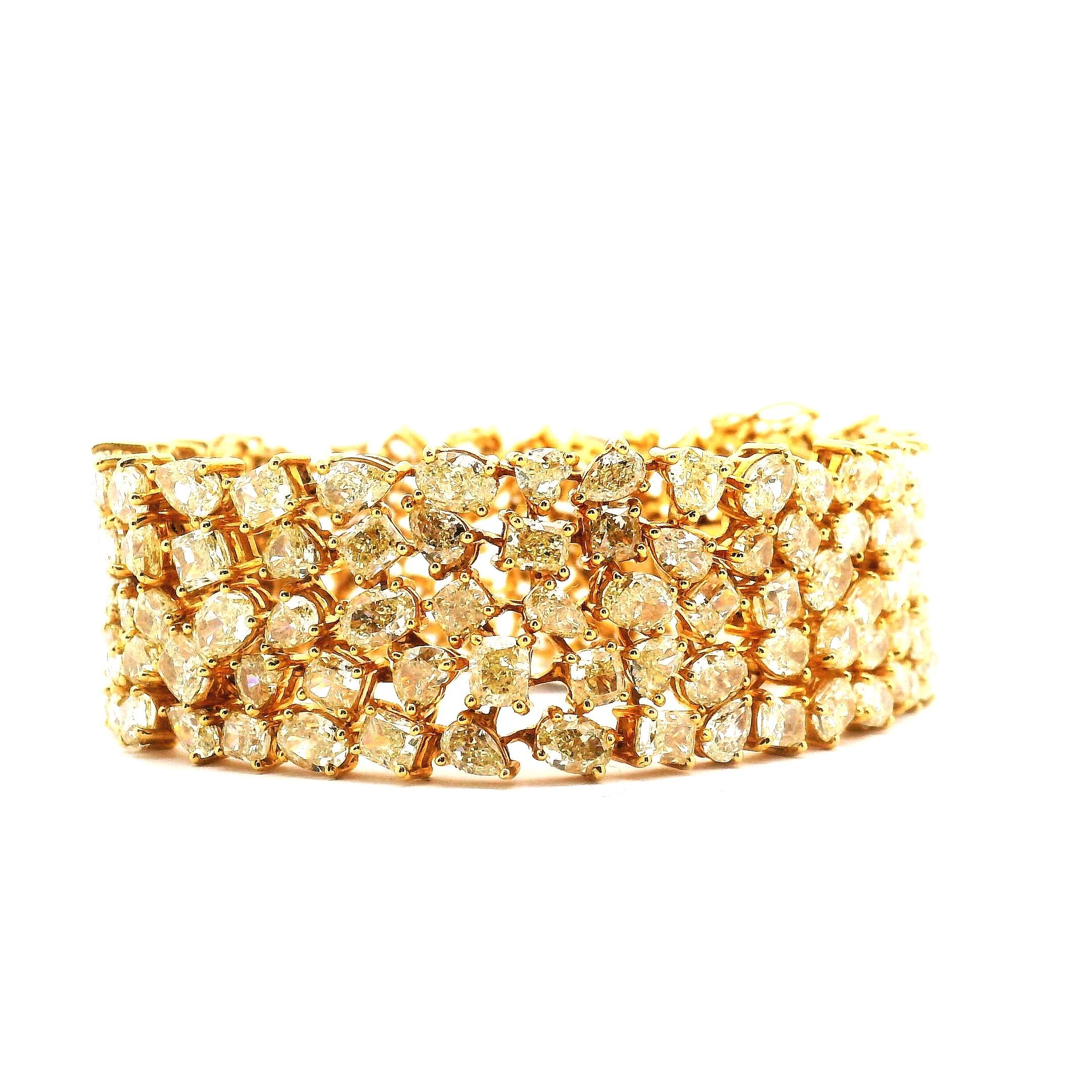 Pulsera mosaico de diamantes amarillos. Las dimensiones son 3/4