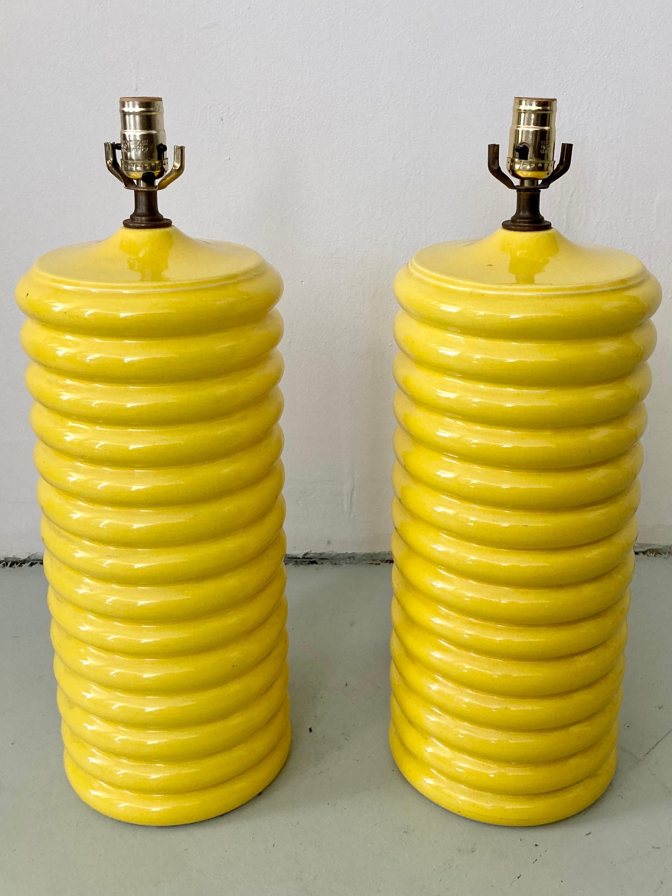 Fun pair of modern yellow glazed ceramic table lamps. Great addition to your boho chic inspired interiors.