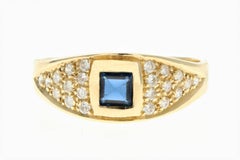 Modern Yellow Gold Sapphire and Diamond Ring
