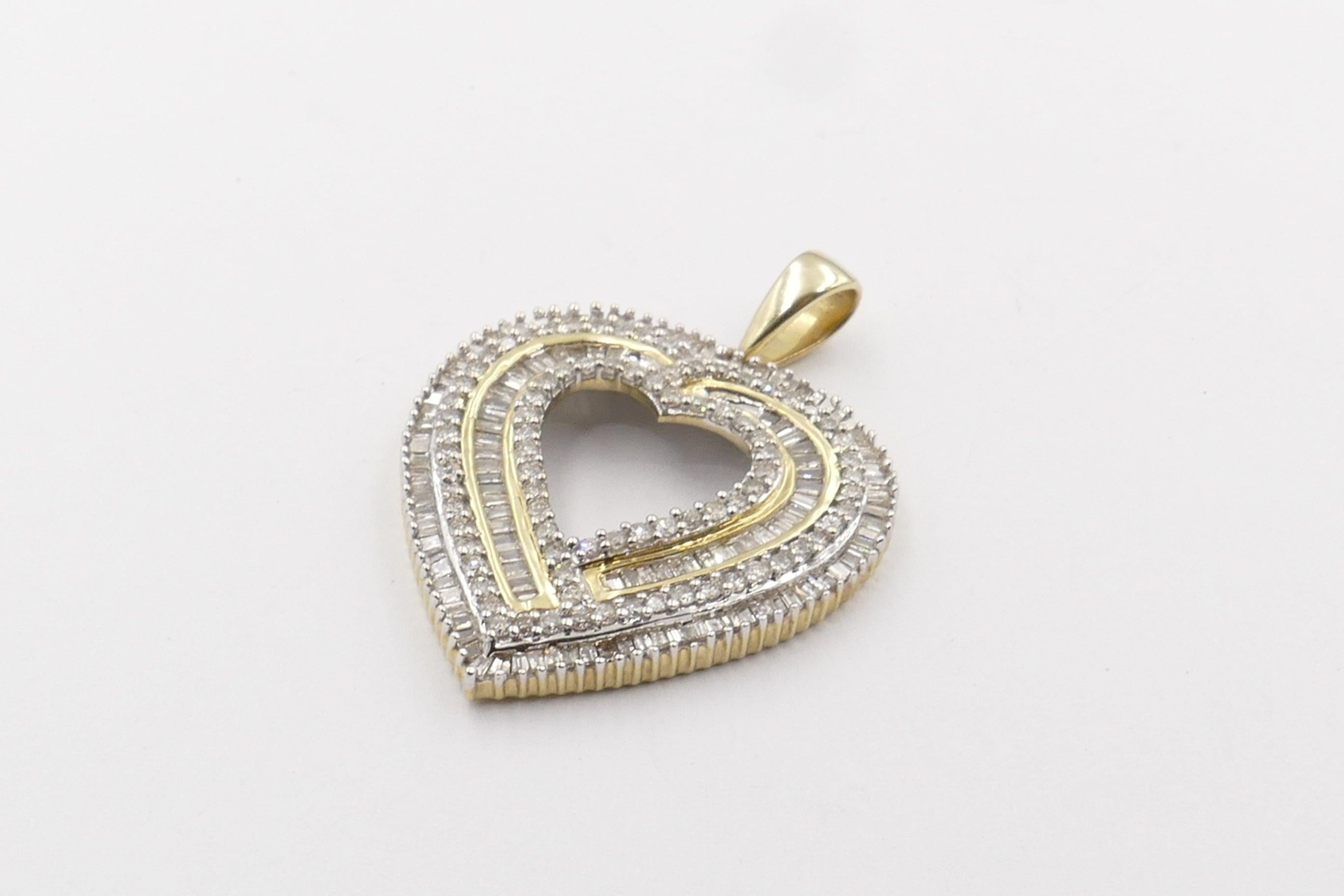 There is a total Diamond Weight of 1.52 carats, featuring both Round Brilliant Cut & Baguette Diamonds in this very pretty, large size Heart Pendant. Very attractive indeed. Looking at it front on it is just beautiful.
Colour of the Diamonds is H-K,