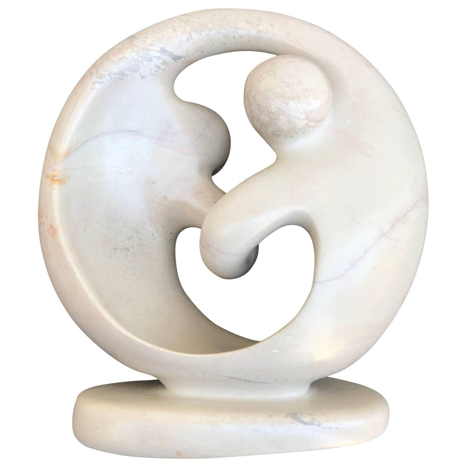 Modern Ying yang marble sculpture.