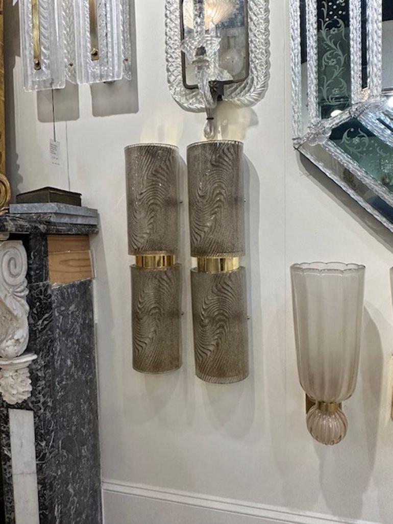 Beautiful pair of modern brown and gold Zebra patterned Murano glass sconces with brass. So much depth and color to this glass. Nice!!