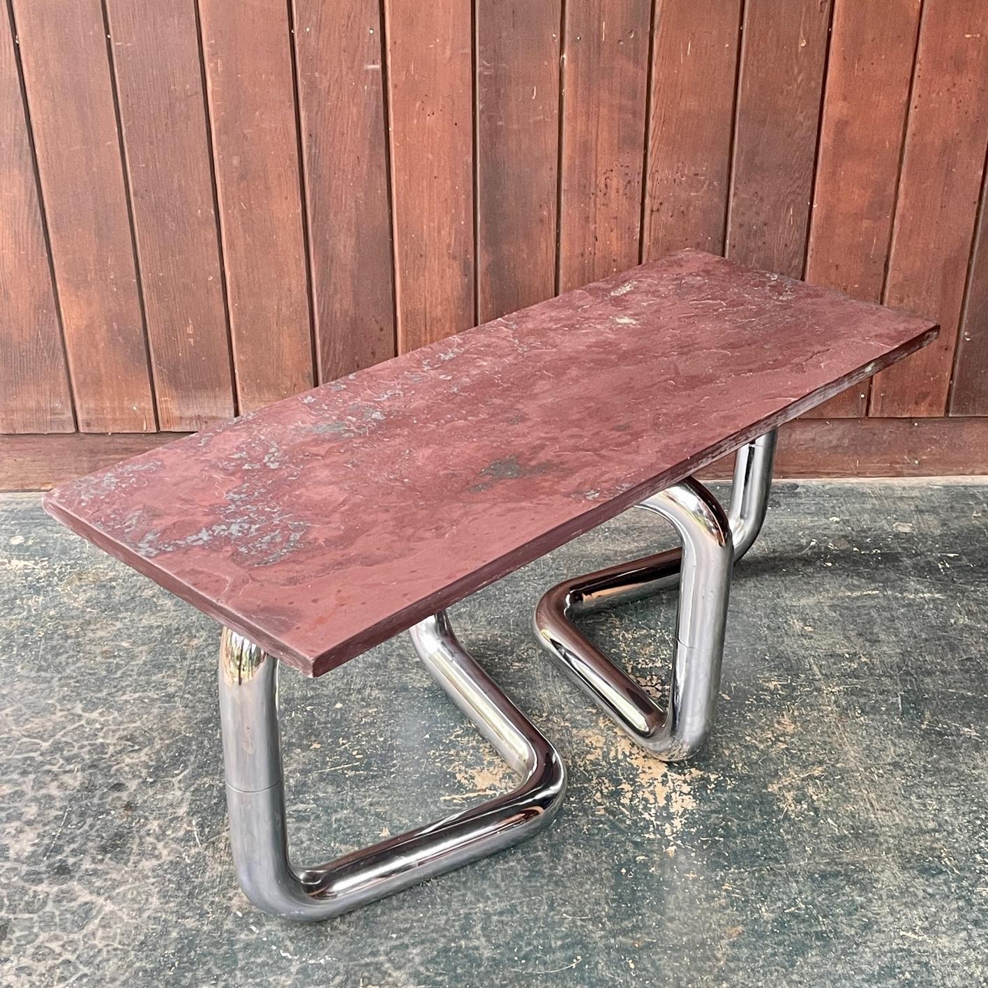 Modern50 Assemblage Coffee Table from Chromed Steel Pipe Table Base with Cast Slate Top. All parts were created in the 1960s-1970s.

The top could be switched out for glass, then we can ship the base to you via FEDEX, then you would order your