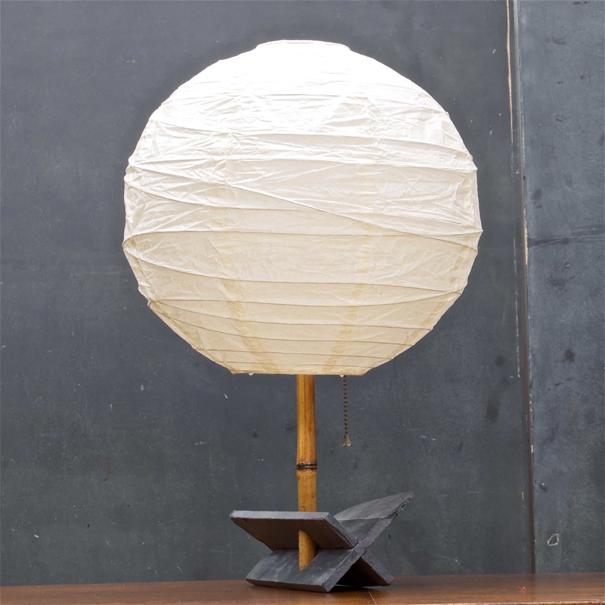 Newly constructed studio made lamp, artist signed. with new Rice paper globe; diameter is 13 inches.