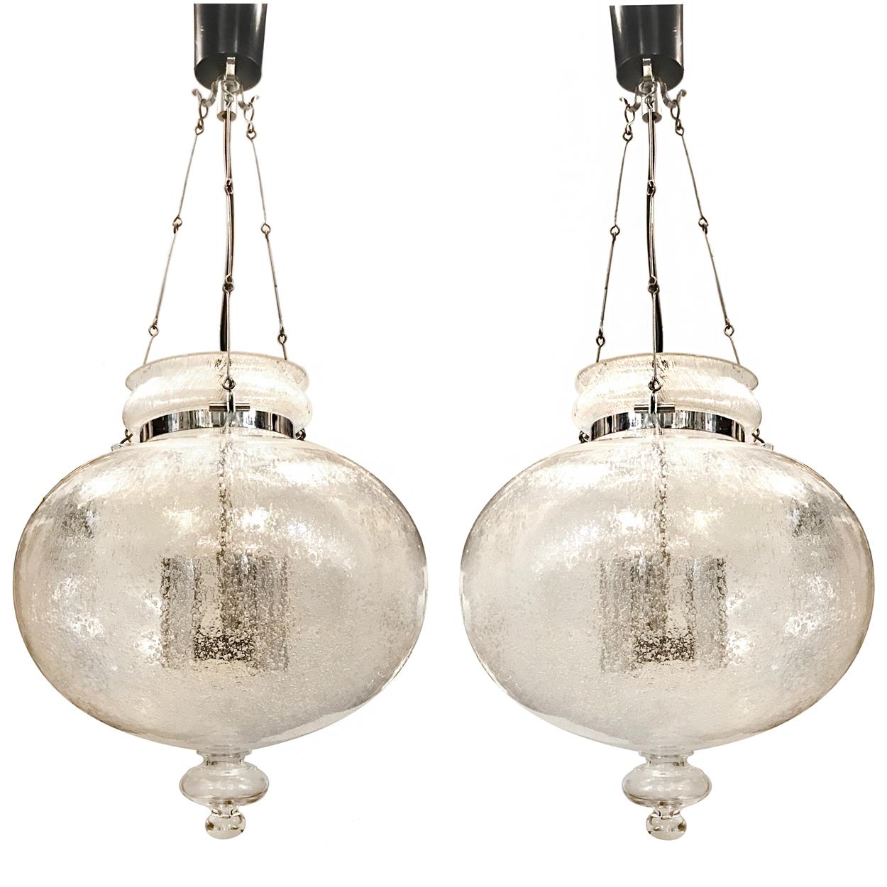 A pair of circa 1960's Italian blown glass lantern with nickel plated body. Sold individually.

Measurements:
Current drop: 29.5