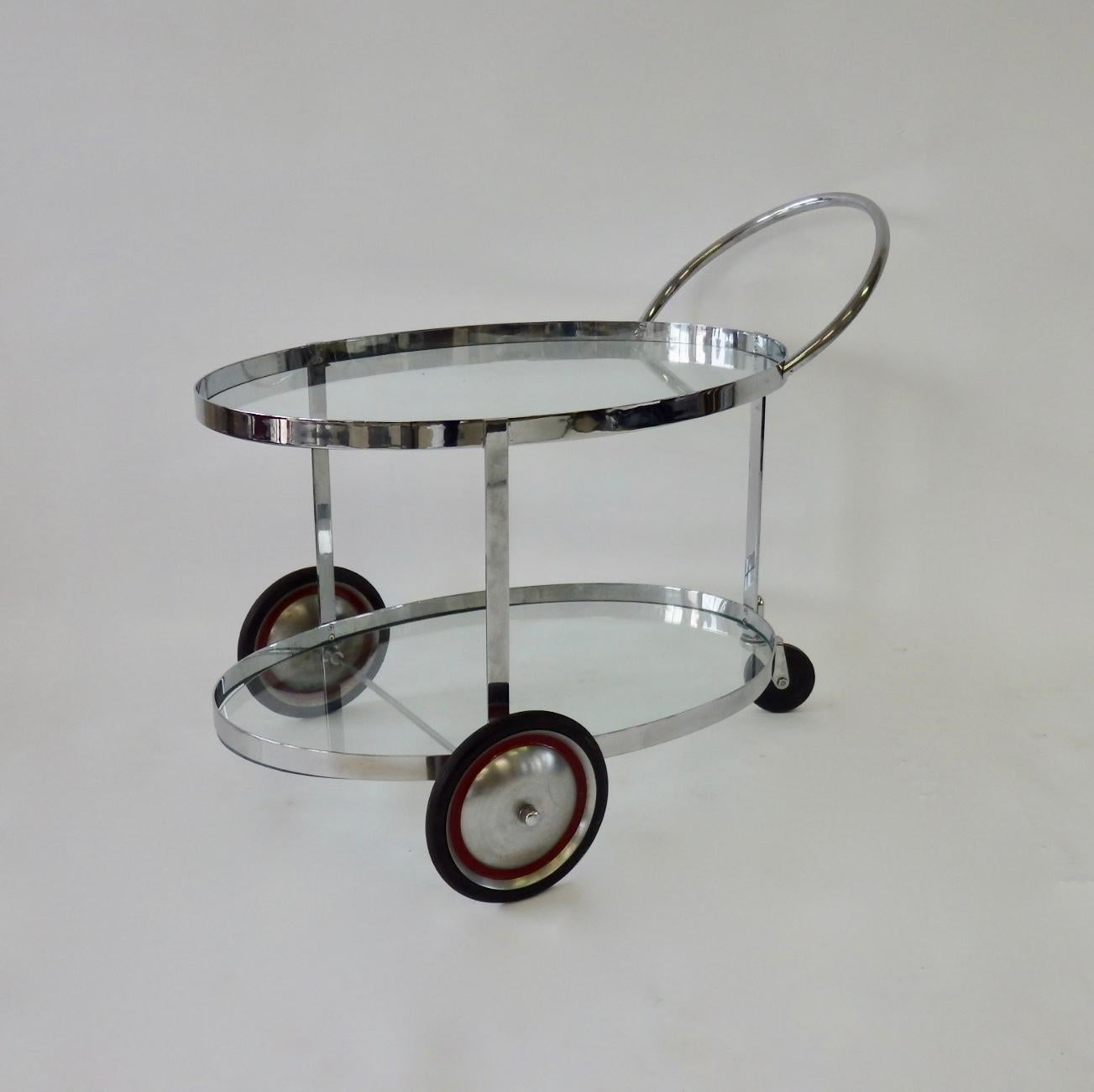 Polished Machine age art deco two tier chrome drinks cart in the style of Gilbert Rohde  For Sale
