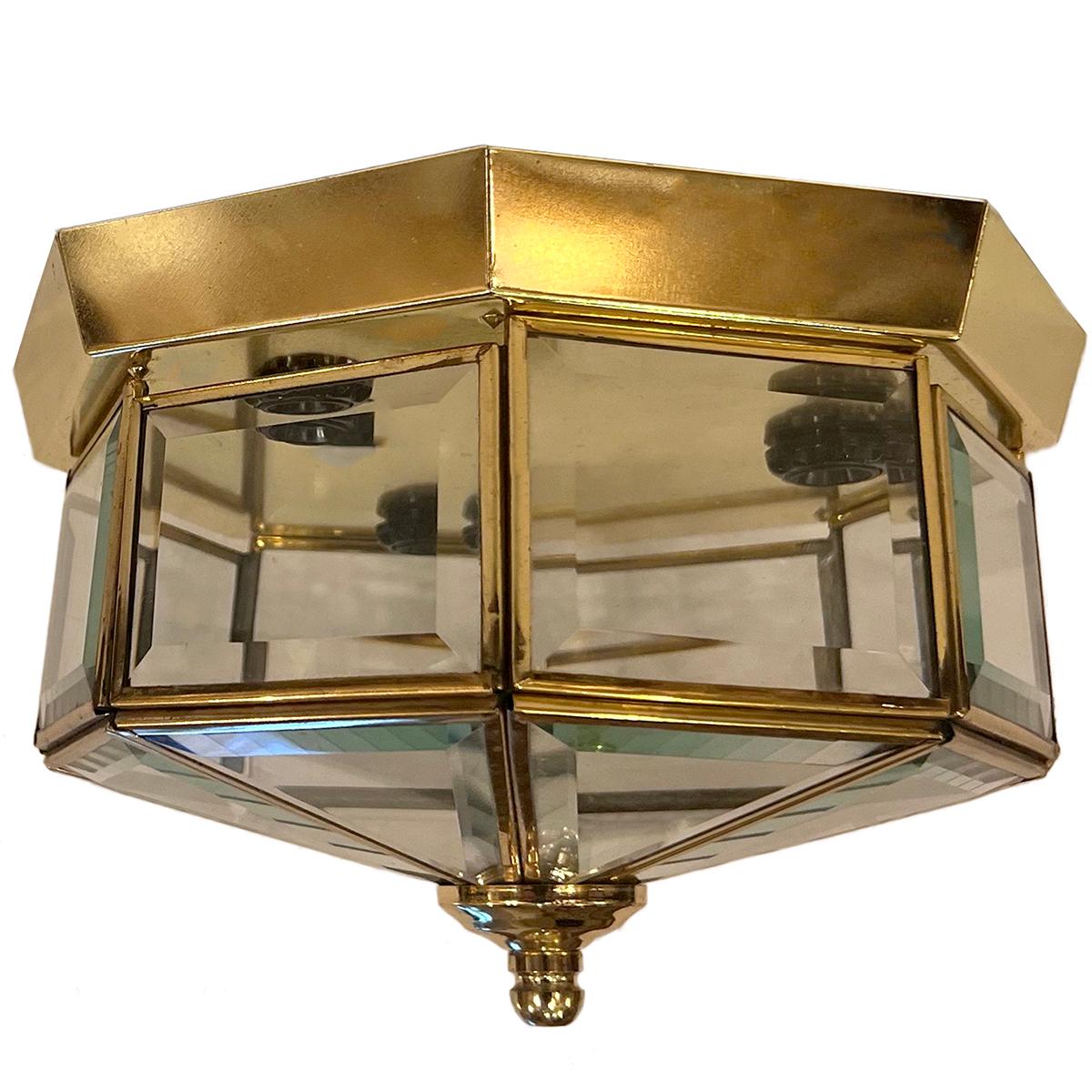 A circa 1960's Italian light fixture with beveled glass. 3 interior candelabra lights. 

Measurements:
Height: 5.5