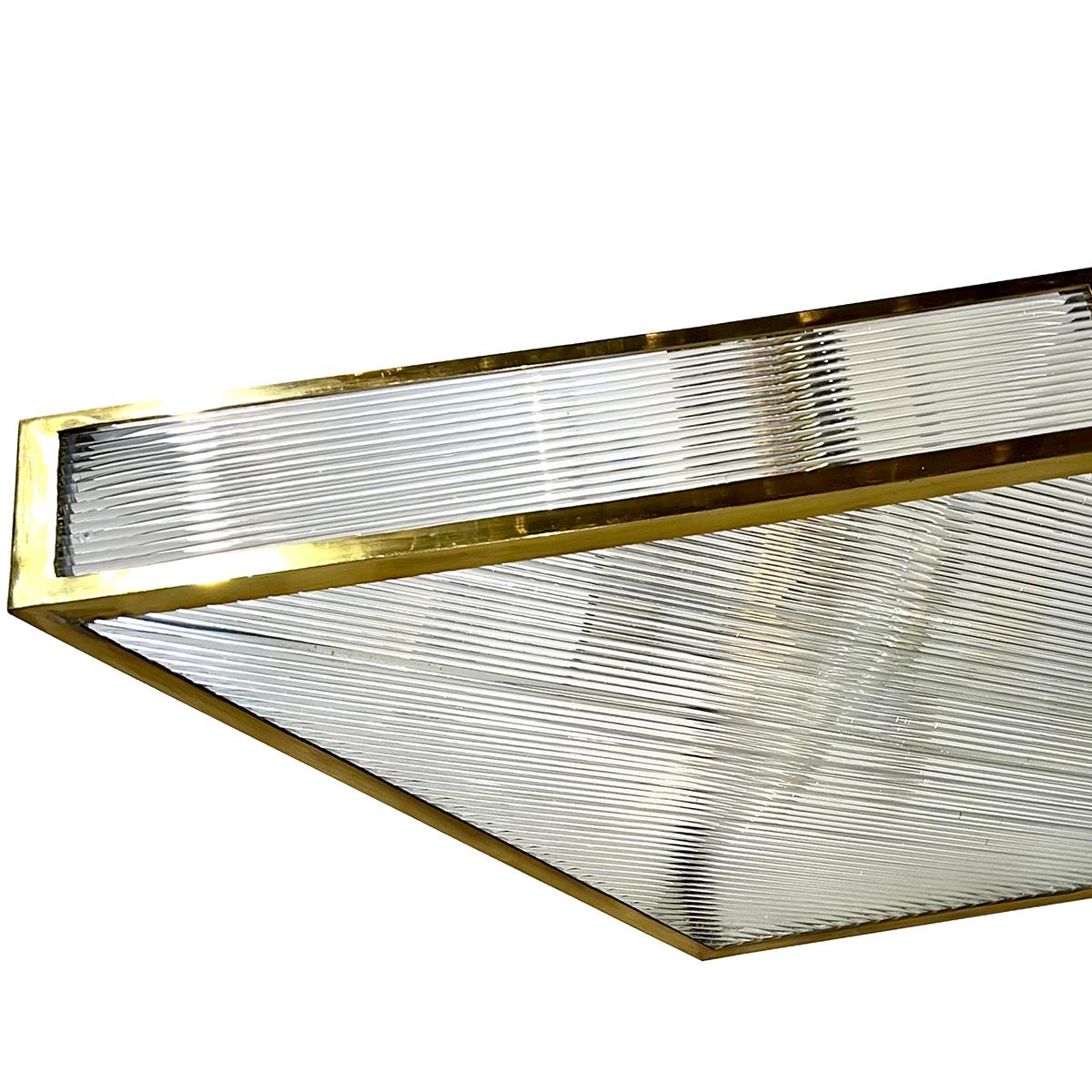 A mid century Italian diamond shaped fixture with glass rods and interior lights.

Measurements:
Length: 47″
Width: 25″
Drop: 24″